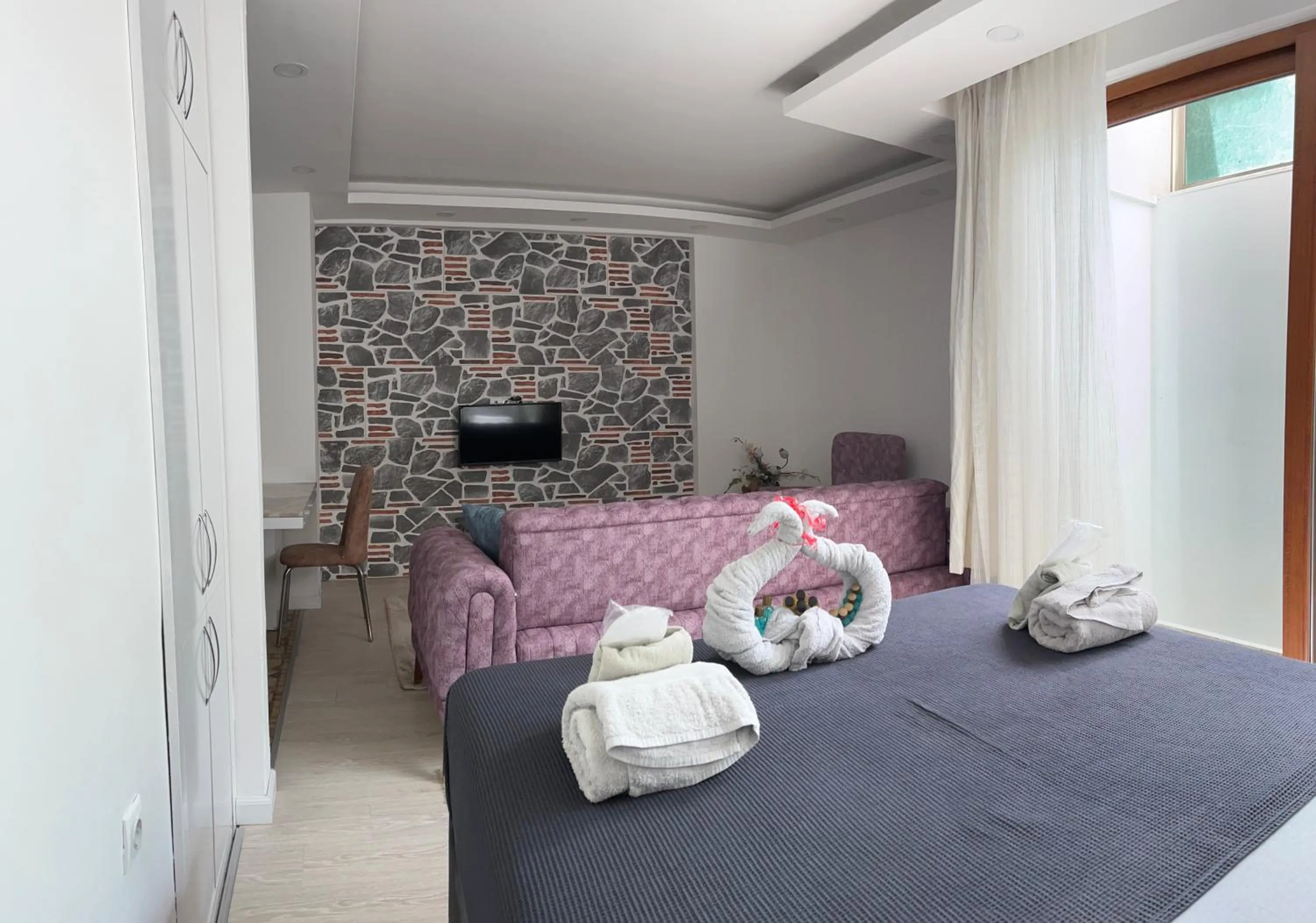 Bed in Gardenya Lara Suit Hotel