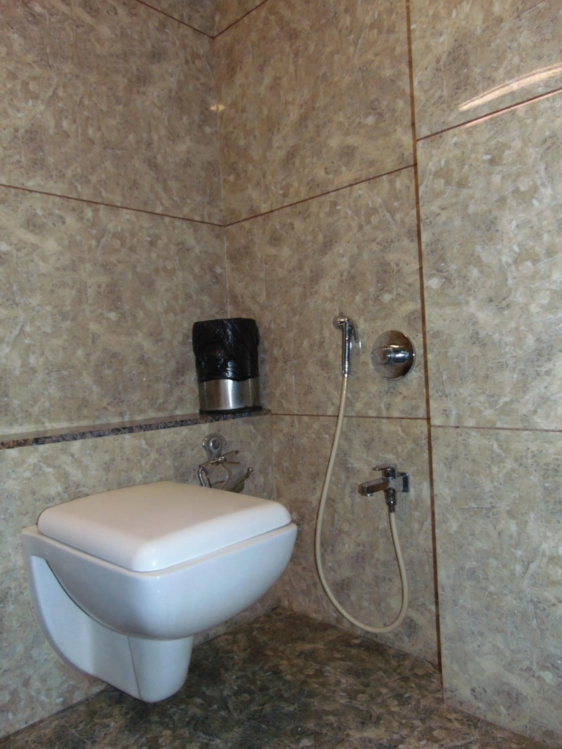 Shower in HOTEL REST INN