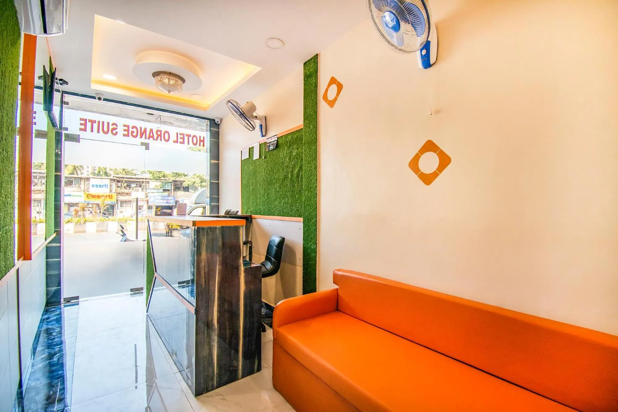 Seating area in FabExpress Orange Suites - Nr Mumbai International Airport