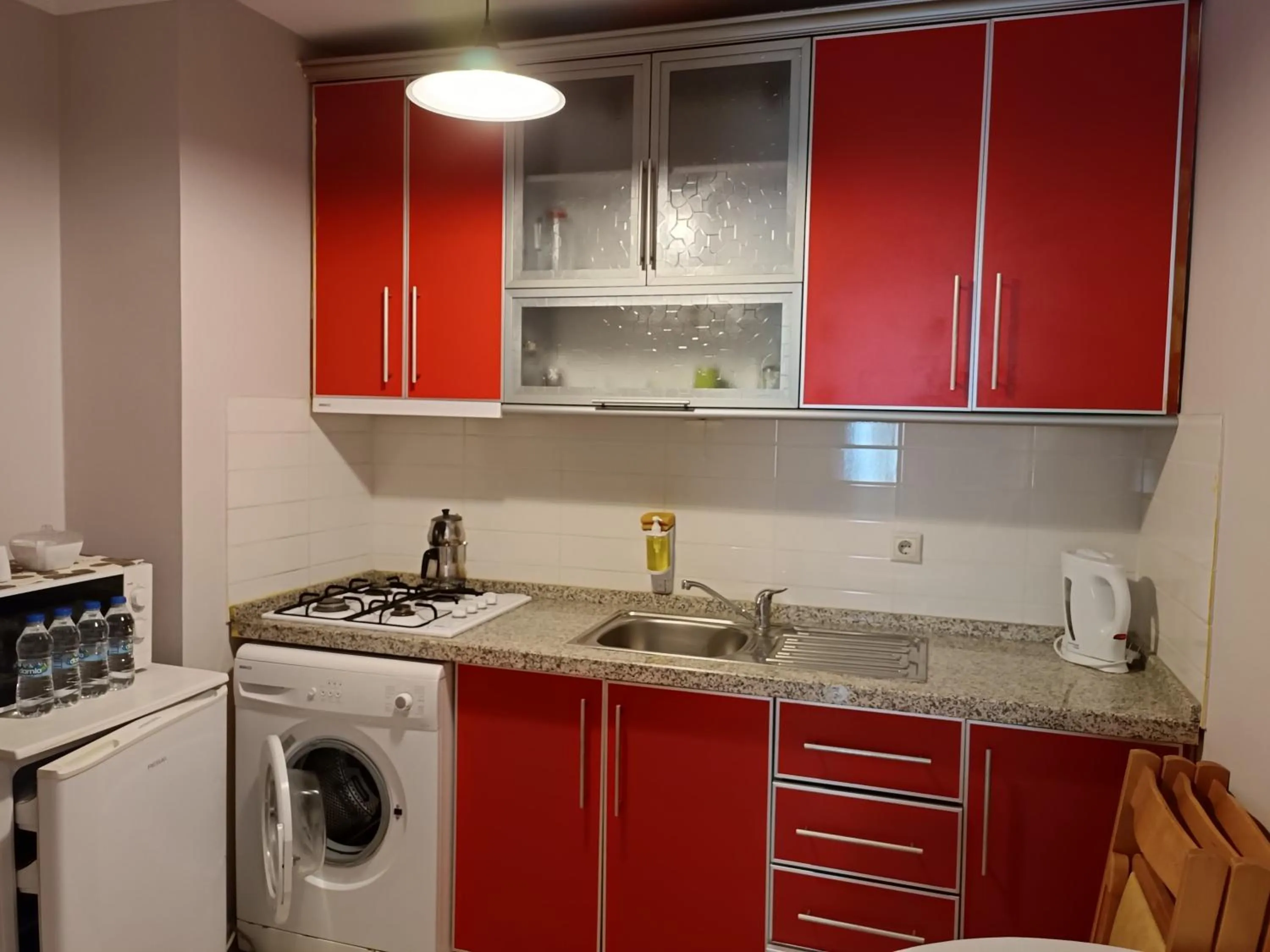 Kitchen or kitchenette in The City Residence Hotel
