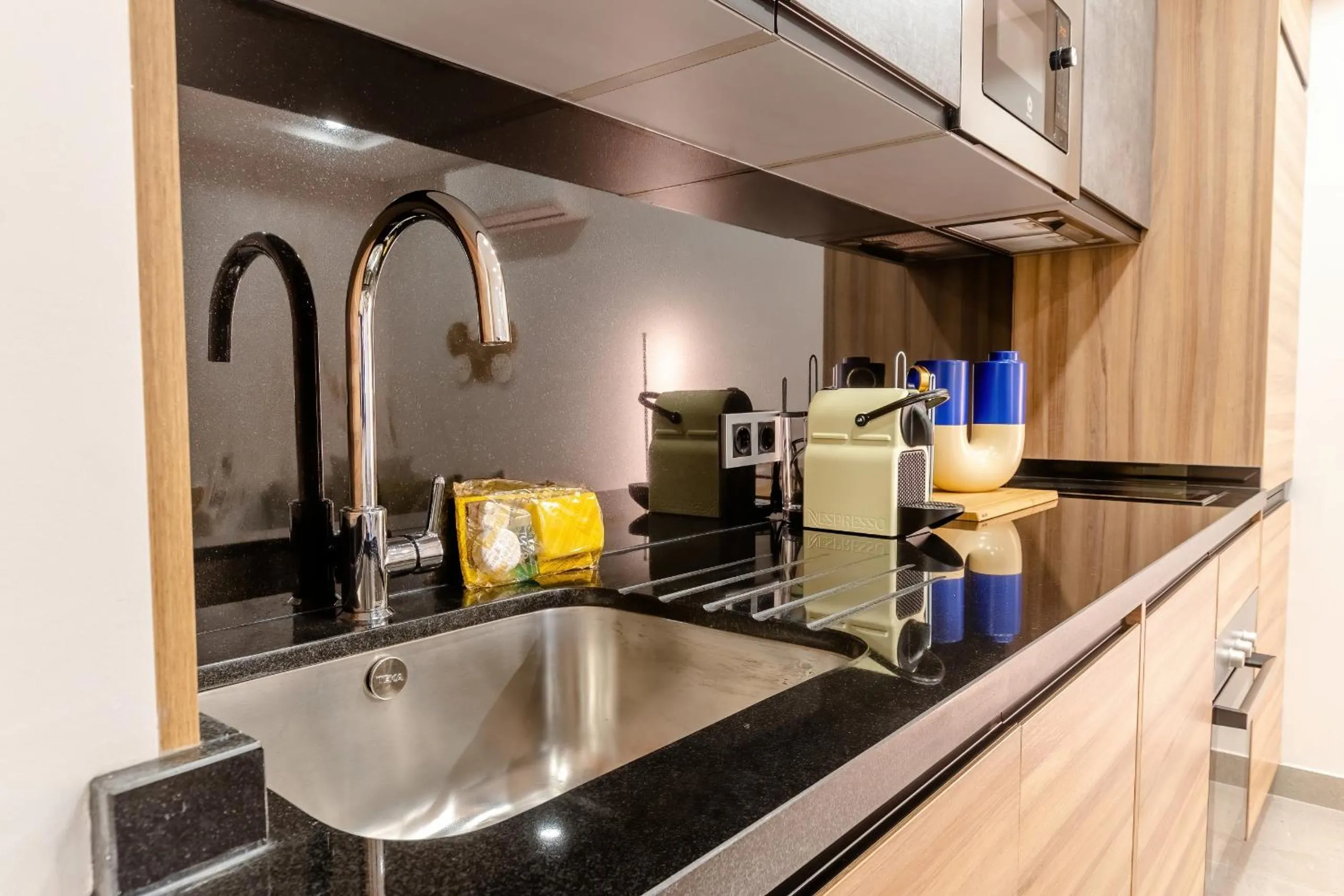 Kitchen or kitchenette in Housing Muelle Uno by SharingCo