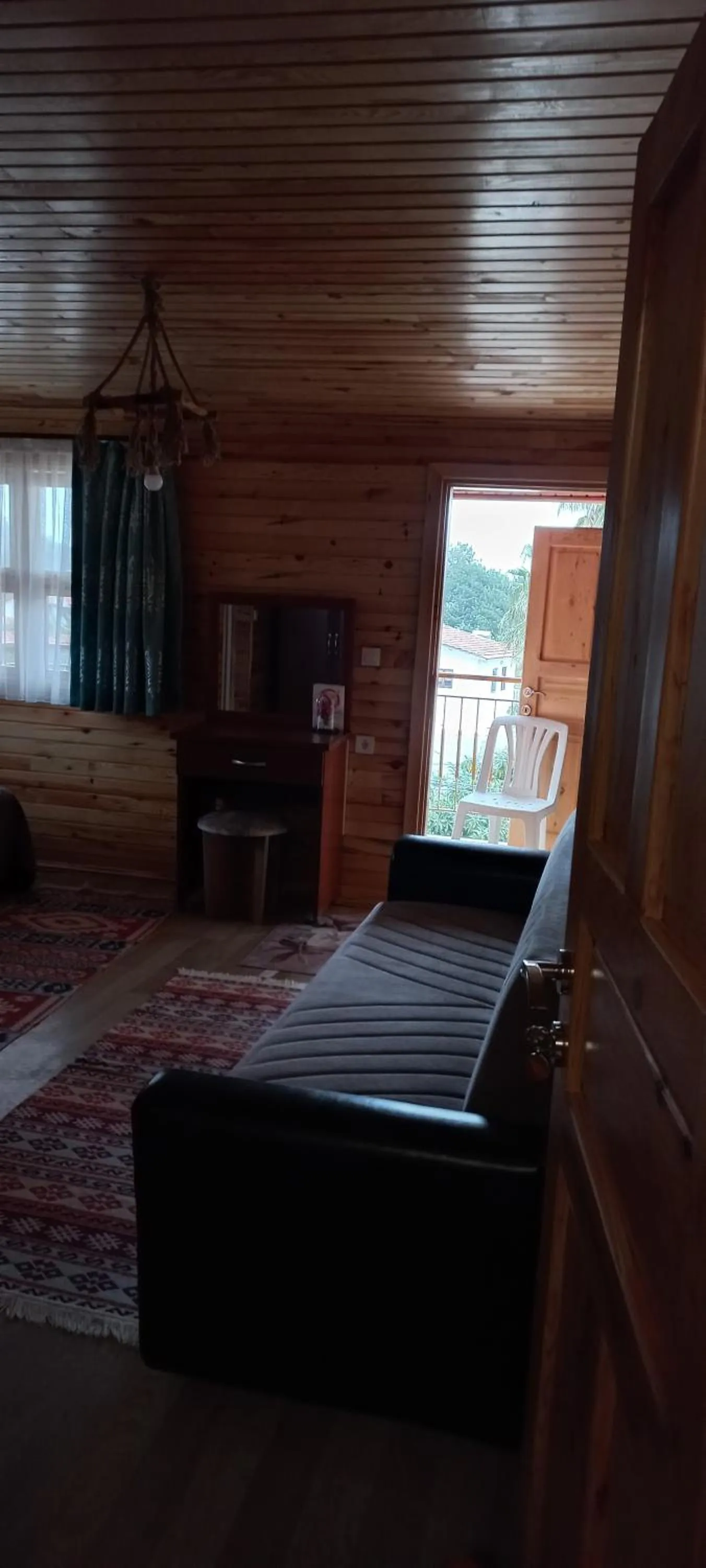 Communal lounge/ TV room, Bed in Rosemary Pansiyon