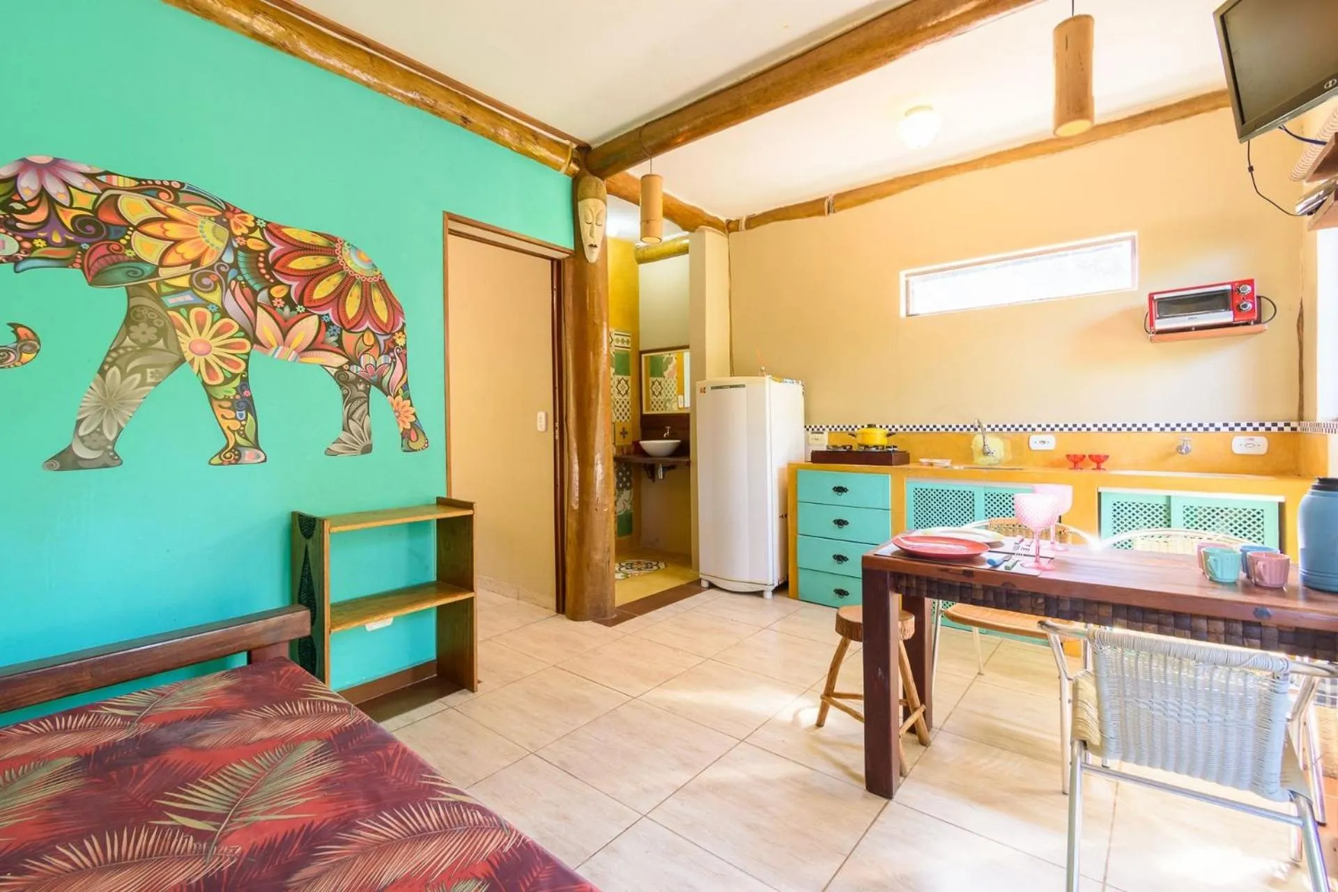 Kitchen or kitchenette in Chalés Yababali Lagoinha