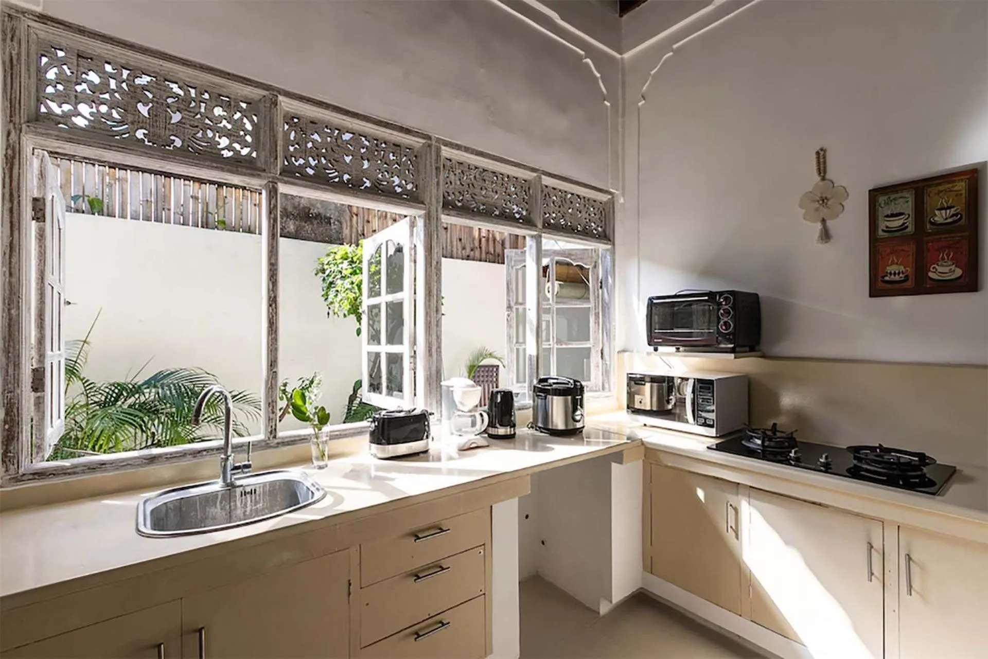 Kitchen or kitchenette in Villa Nyama by Optimum Bali Villas
