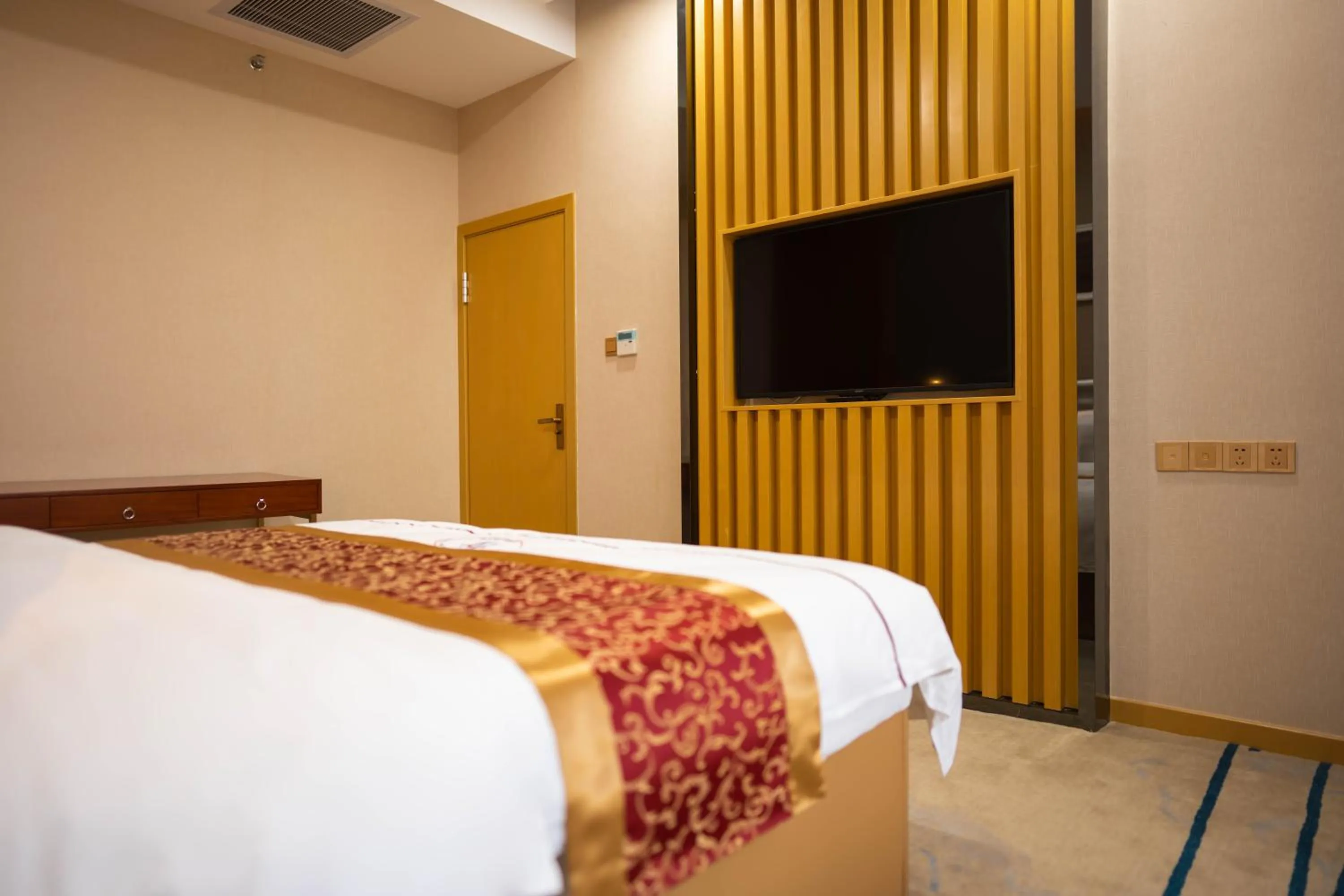 Bed in ST Vegas Hotel