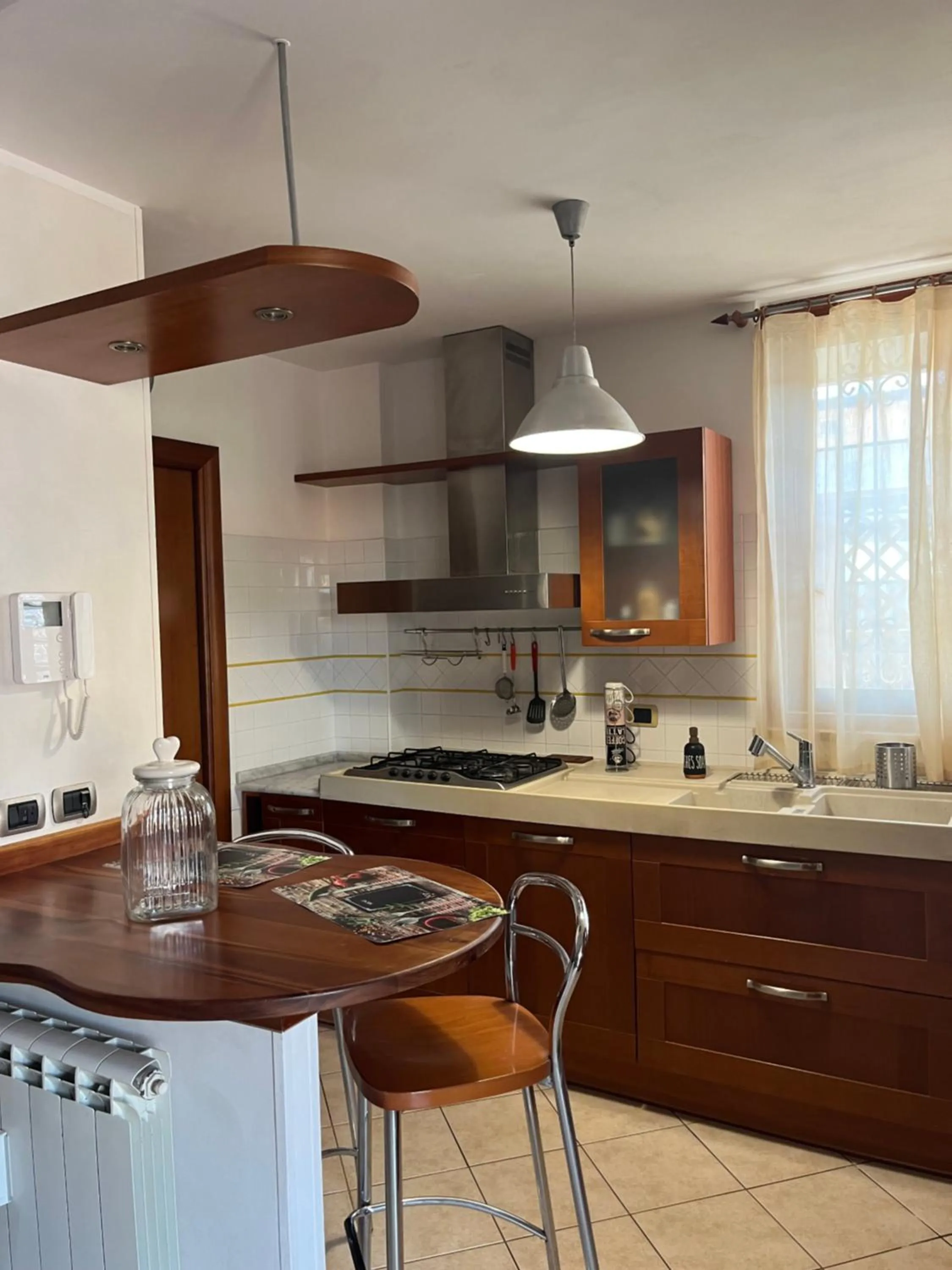 Kitchen or kitchenette in Attico con terrazza in Via dei Traghetti
