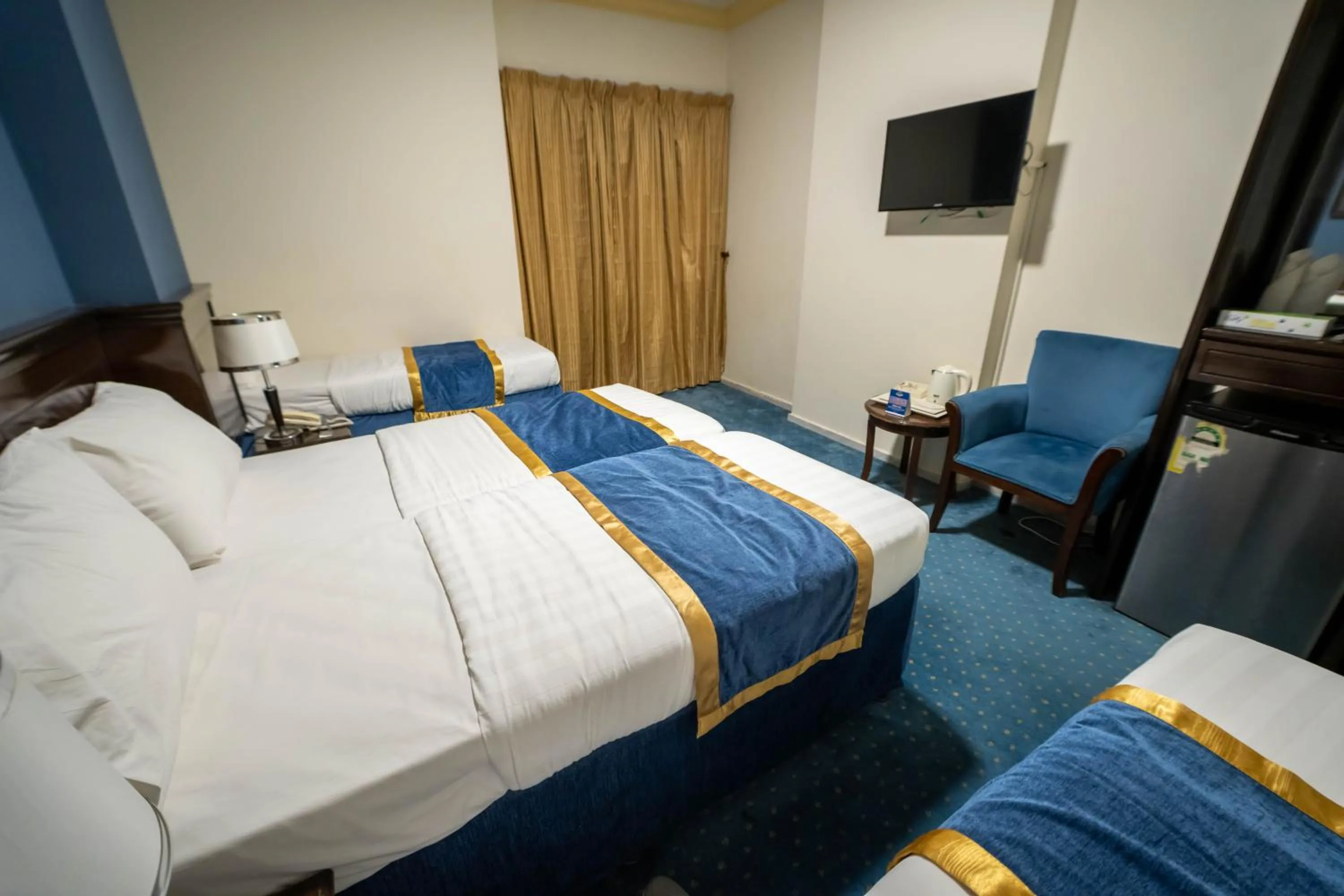 Bed in Al Barakah Mawaddah Hotel