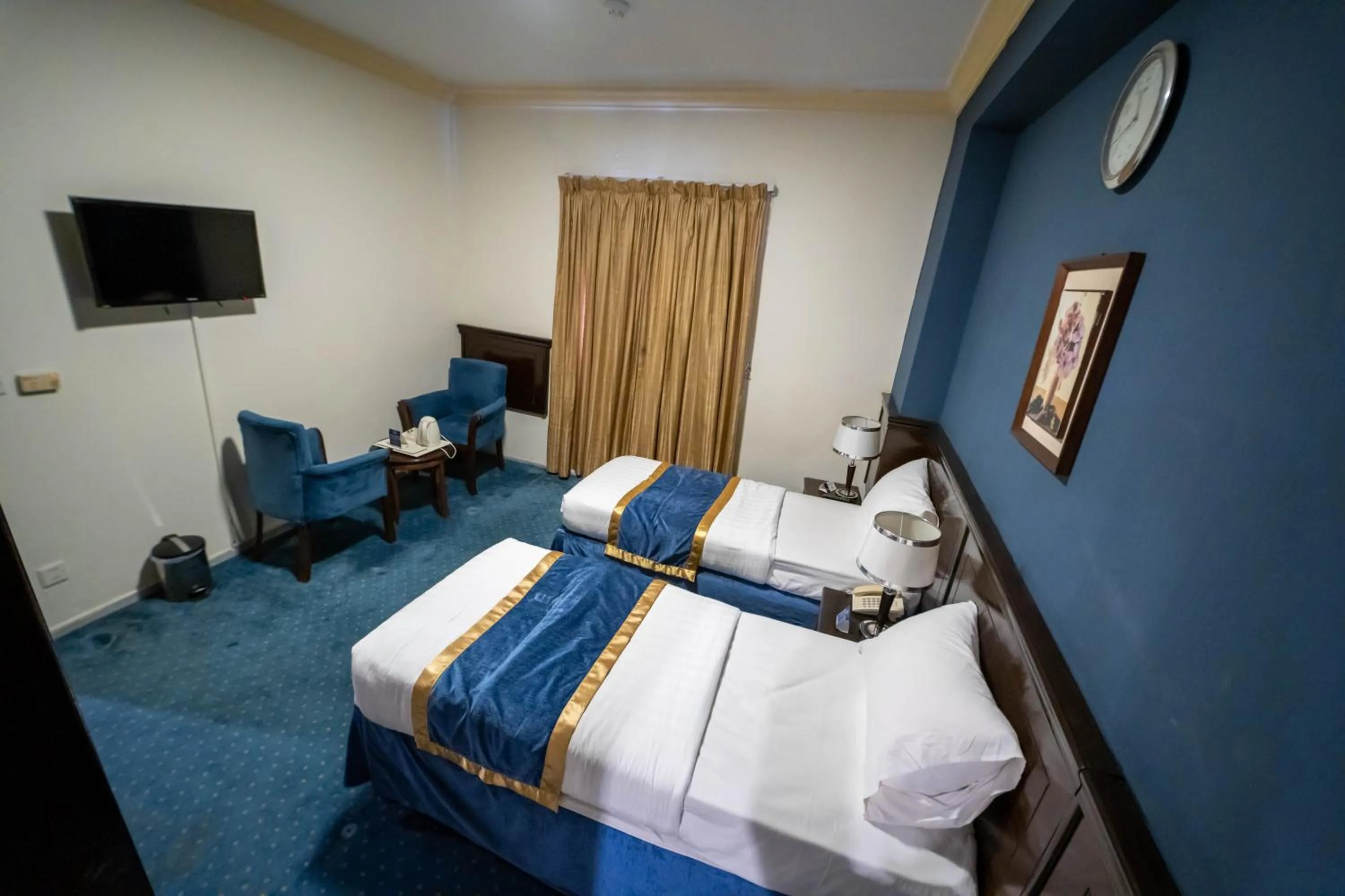Photo of the whole room, Bed in Al Barakah Mawaddah Hotel