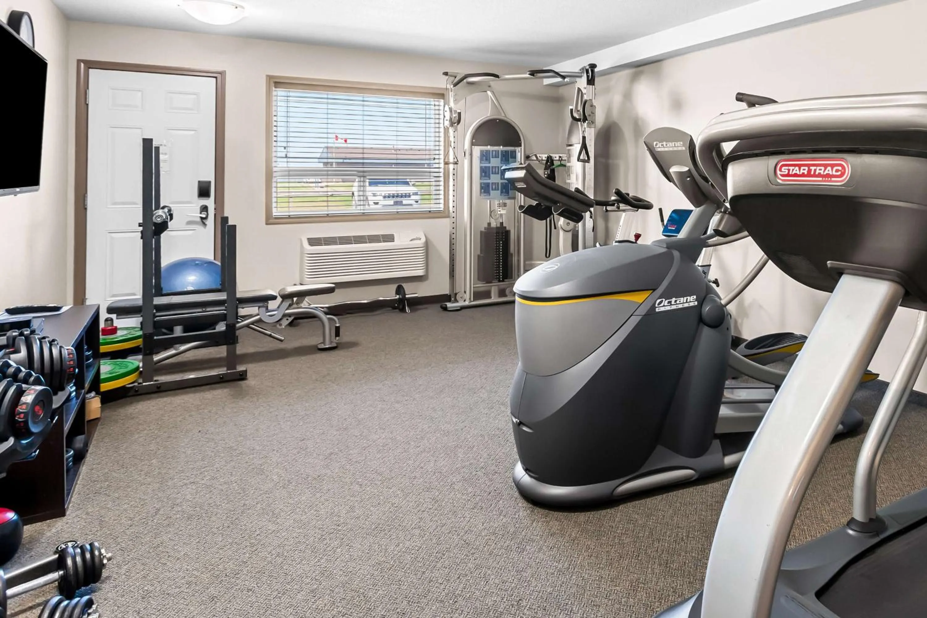 Fitness centre/facilities in SureStay Hotel by Best Western Bassano
