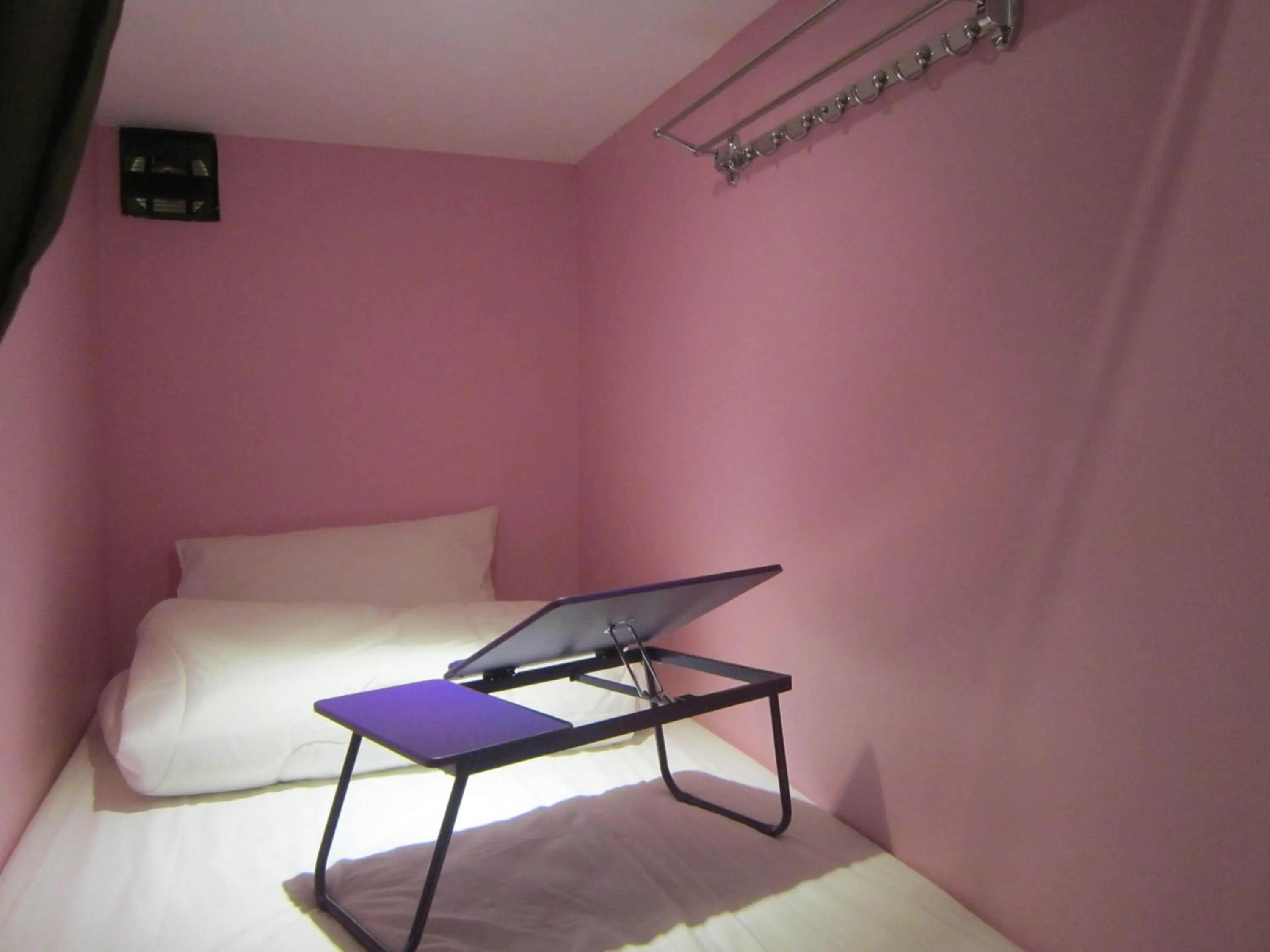 Bed in Thirty Three Stewart Houze