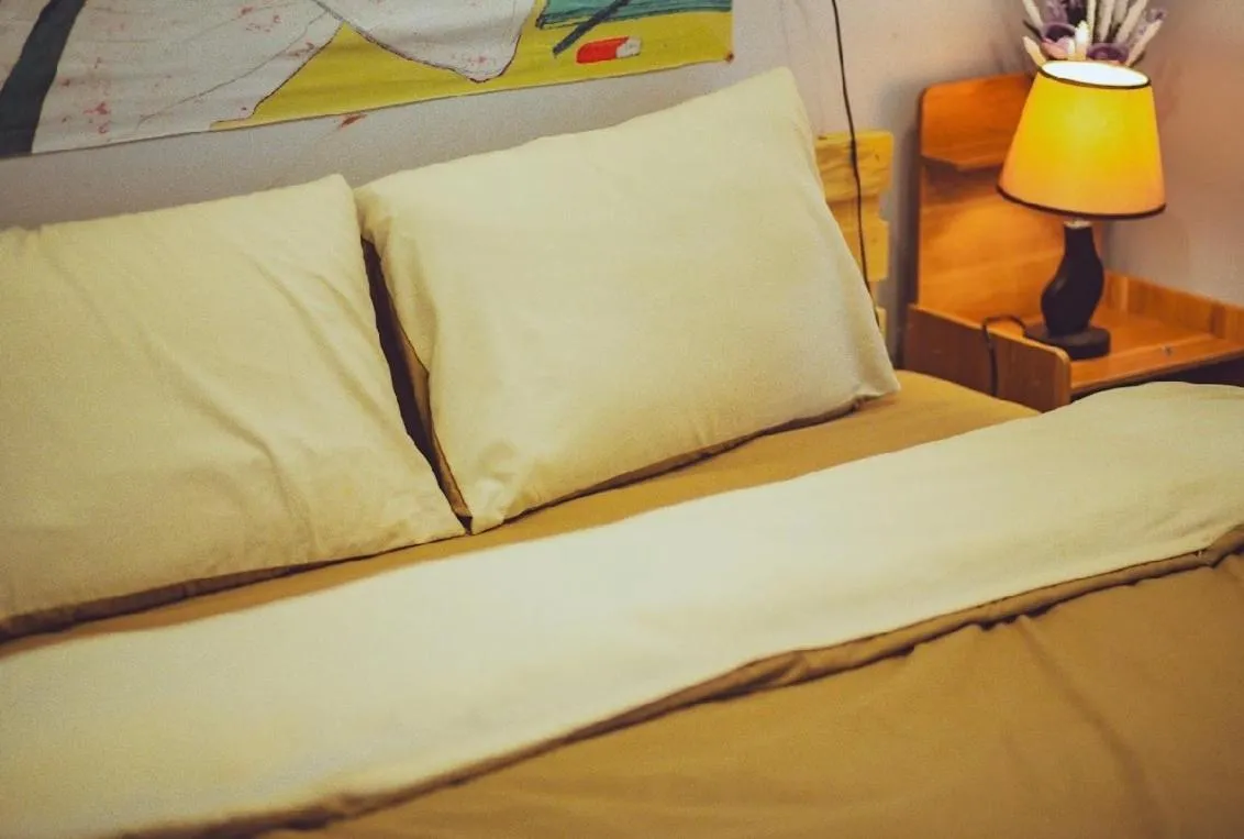 Bed in De Vivre Homestay Măng Đen