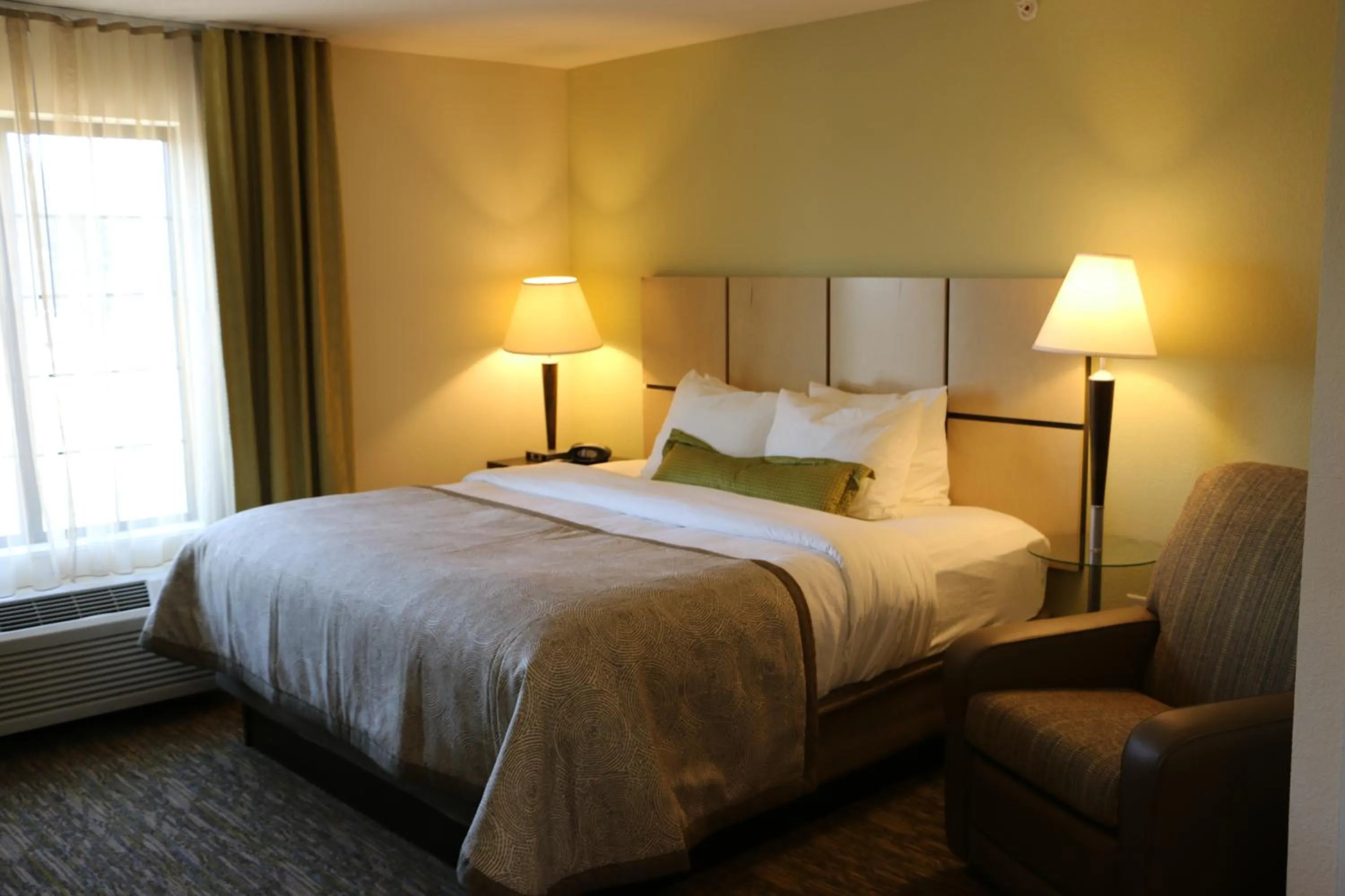 Bed in Candlewood Suites Bloomington by IHG