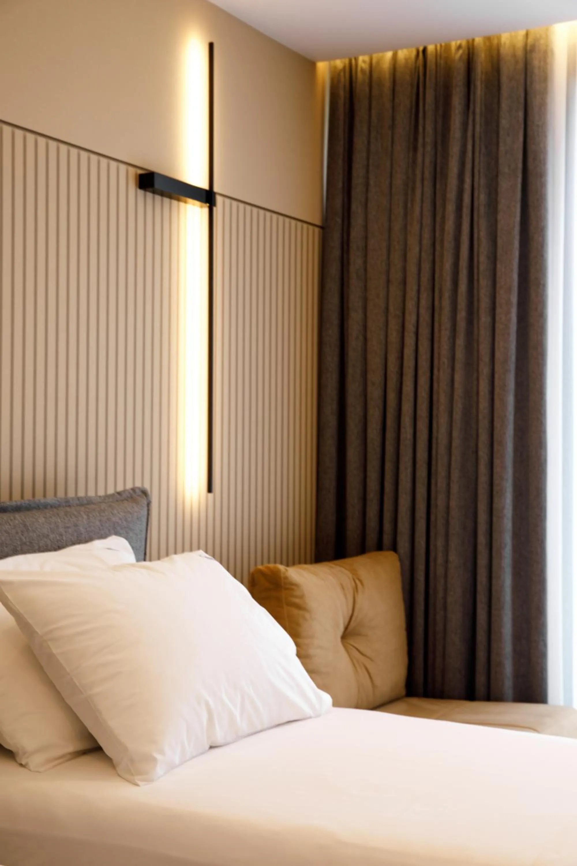 Bed in Caramel Boutique Hotel