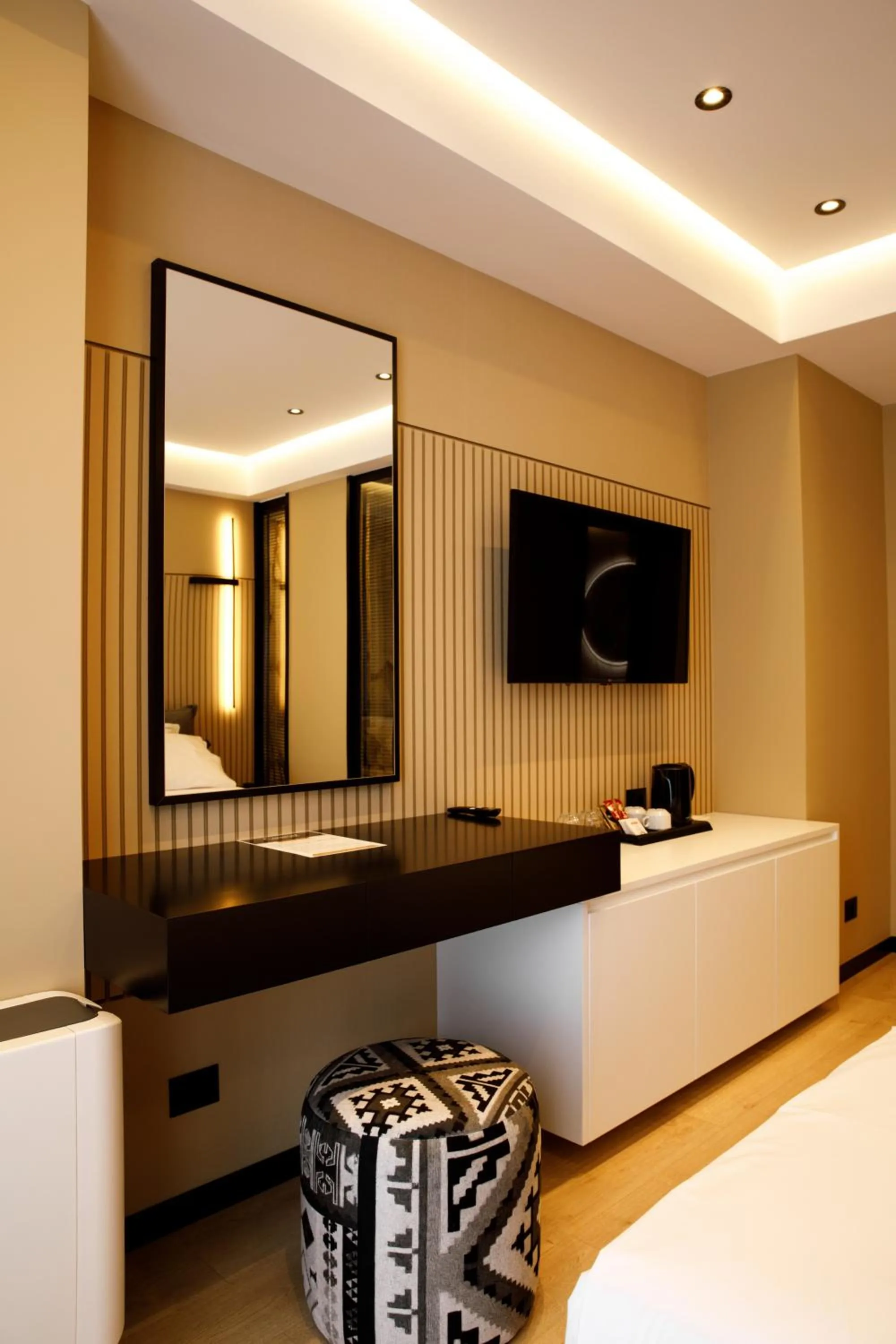 Bed in Caramel Boutique Hotel