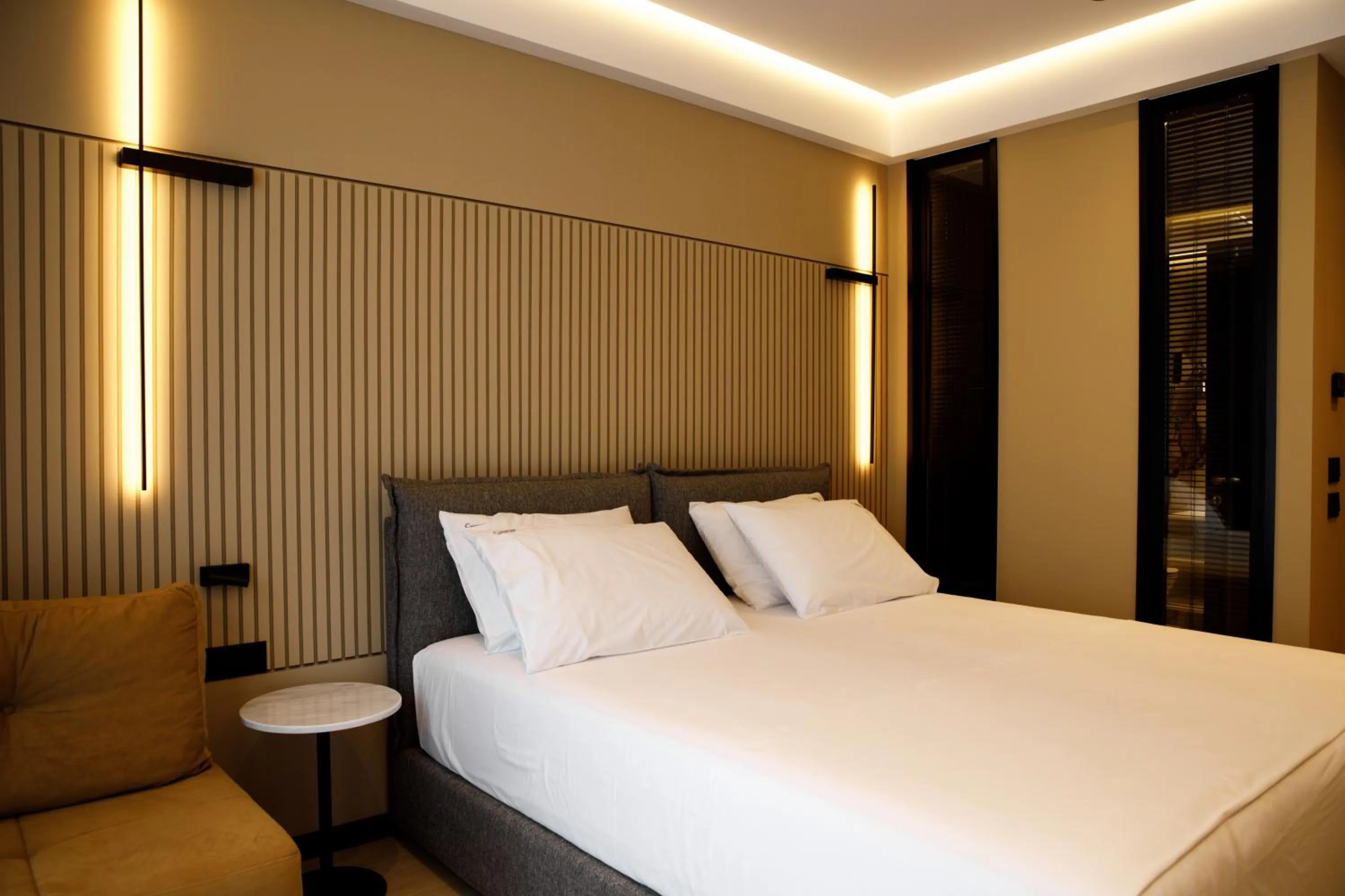 Bedroom, Bed in Caramel Boutique Hotel