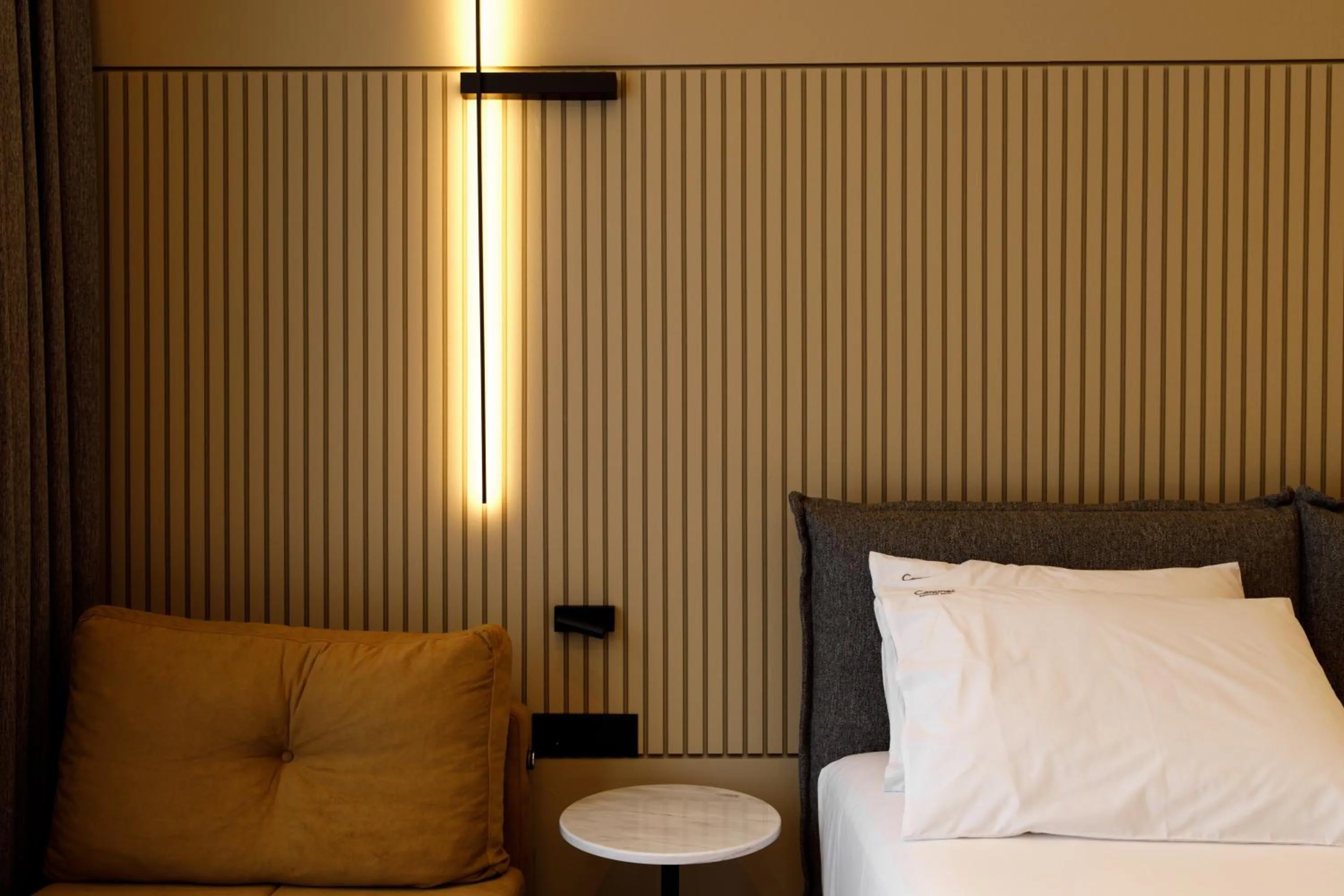 Decorative detail, Bed in Caramel Boutique Hotel