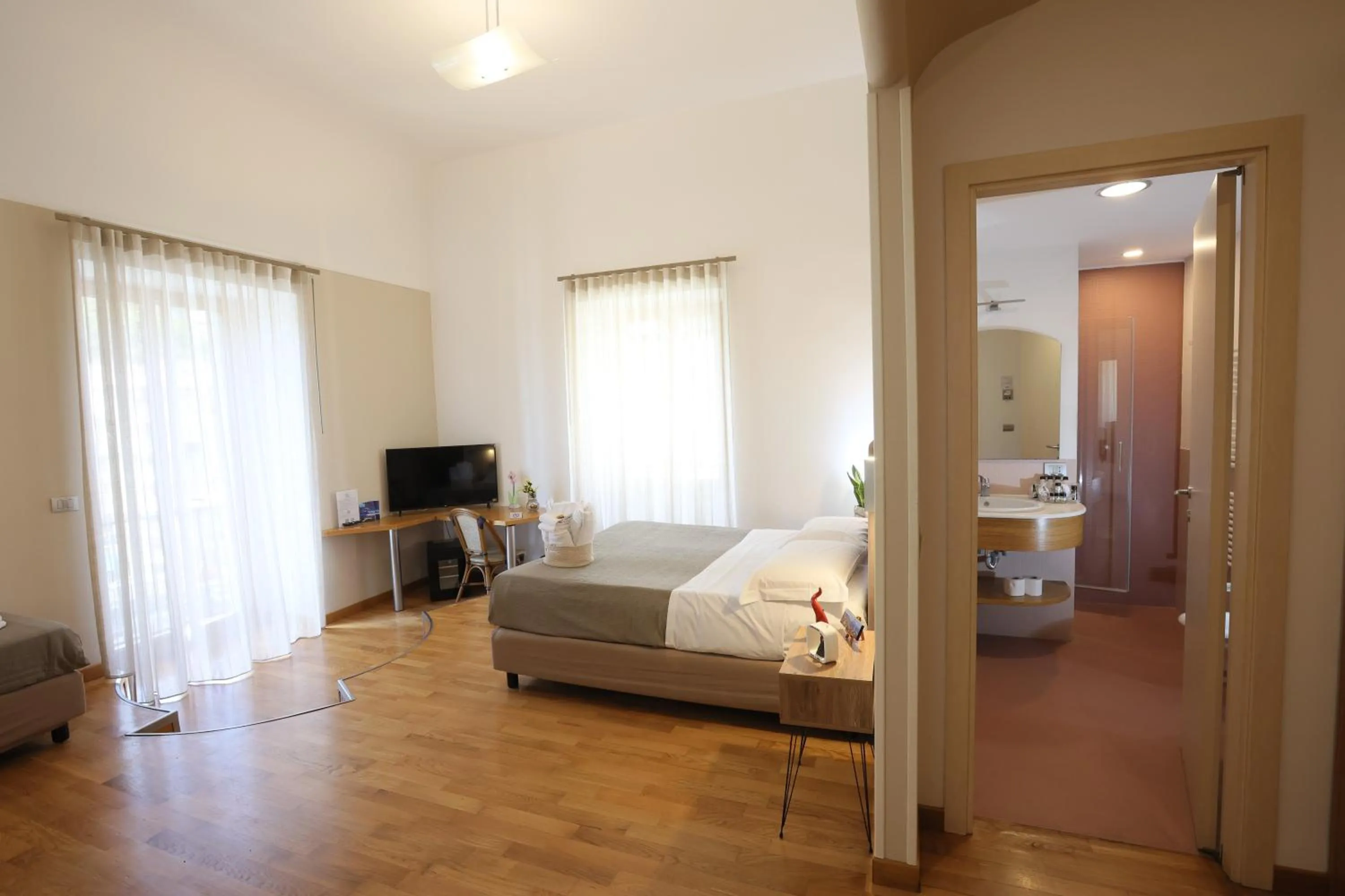 Photo of the whole room, Bed in Lungomare Suite & Spa