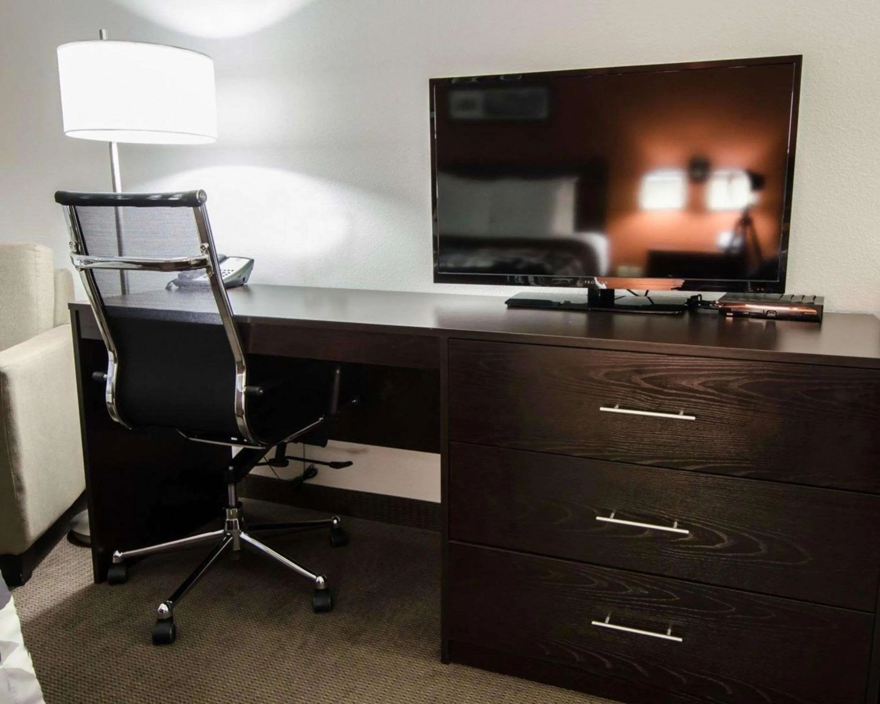 Bedroom in Sleep Inn & Suites And Conference Center Downtown