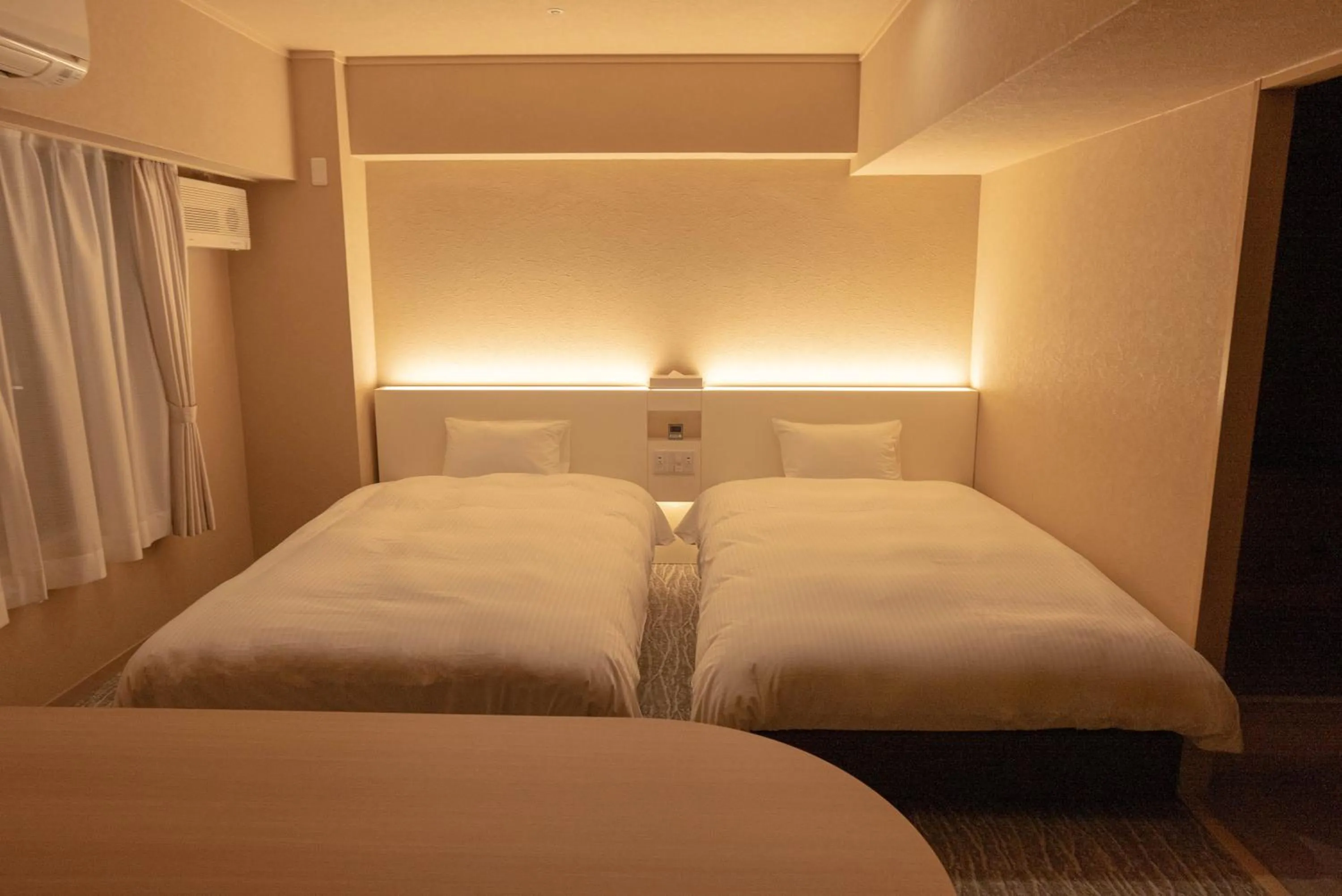 Bed in Hotel Alpha Inn Akita