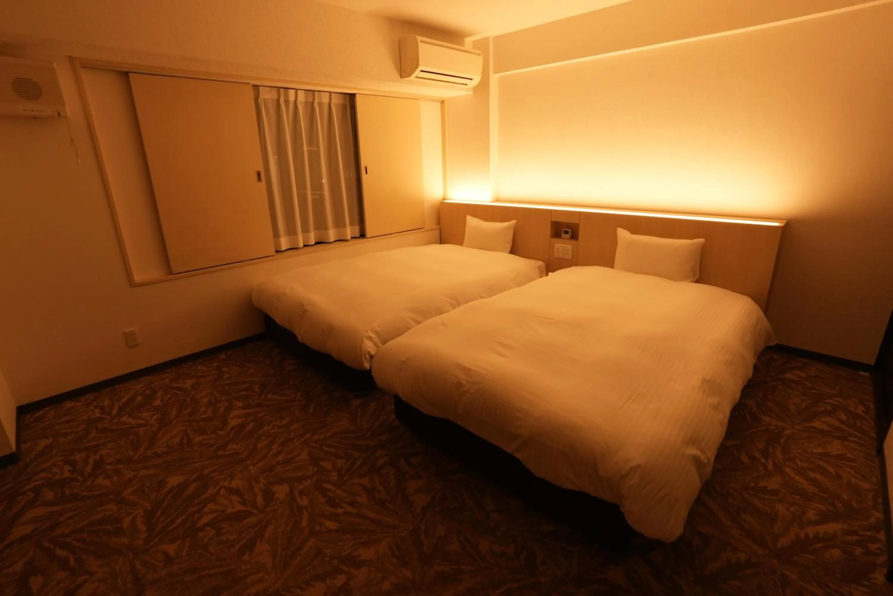 Bed in Hotel Alpha Inn Akita