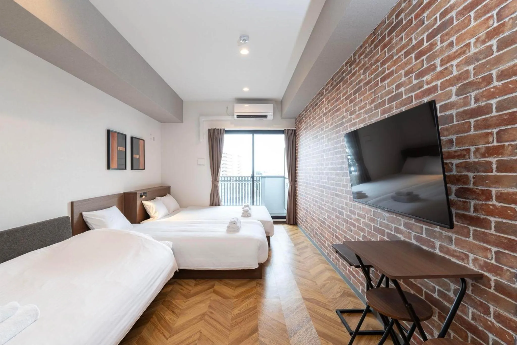 Photo of the whole room, Bed in WELLSTAY Osaka Shinimamiya Station