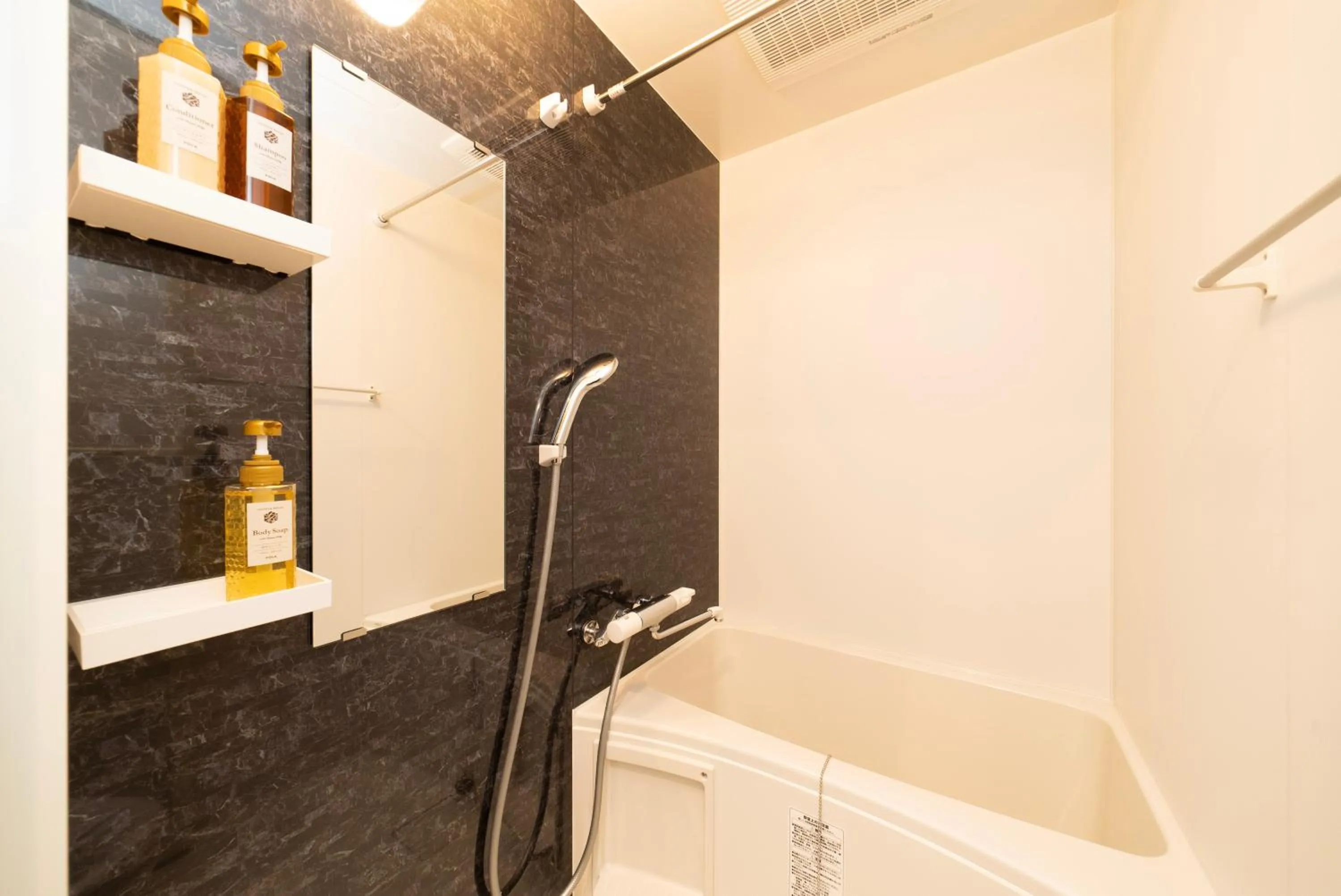 Bathroom in WELLSTAY Osaka Shinimamiya Station