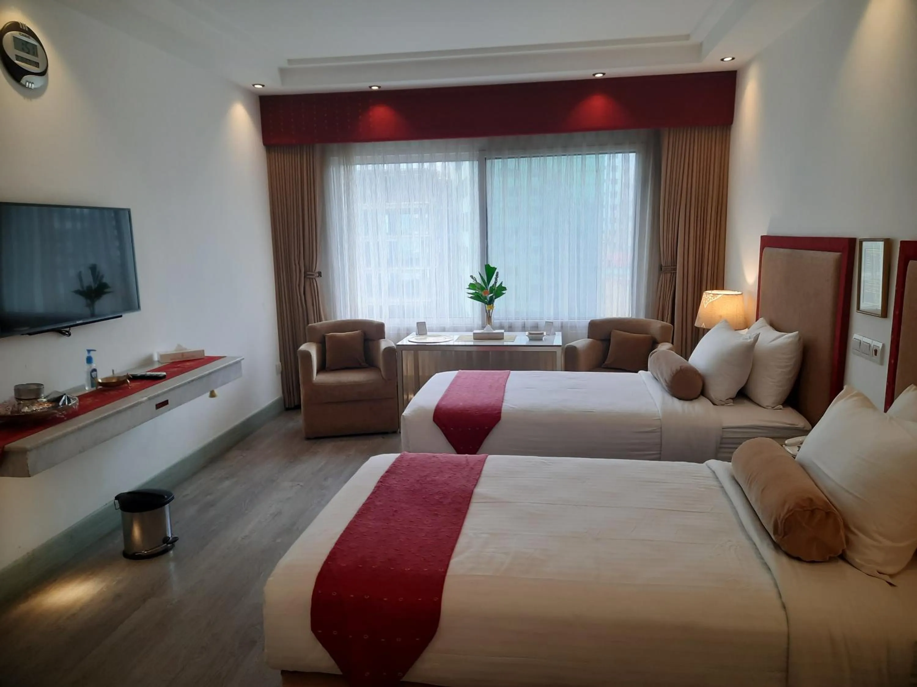 Bed in Hotel Razmoni Isha Kha International