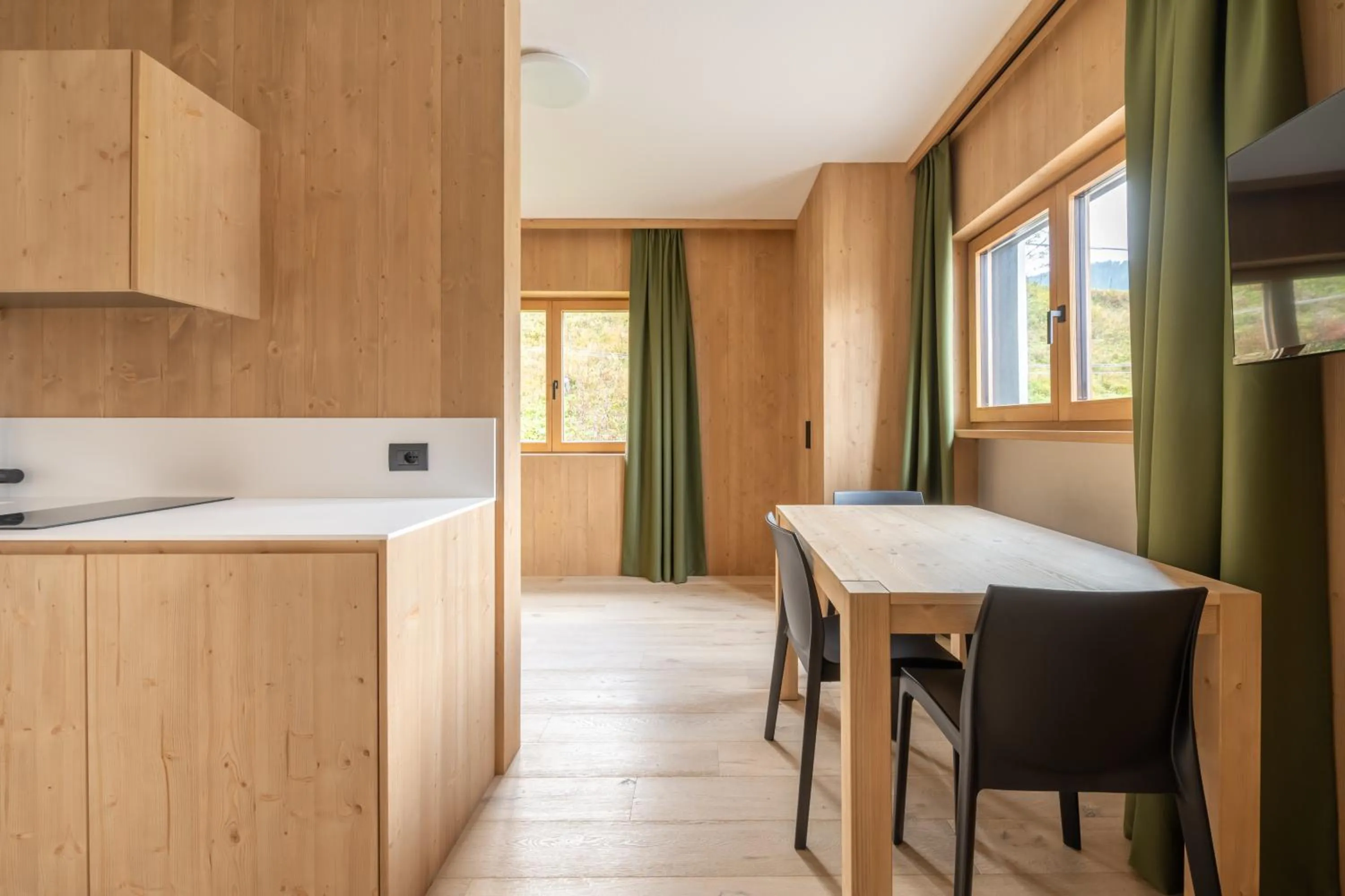 Kitchen or kitchenette in Ama Dolomiti - Residence