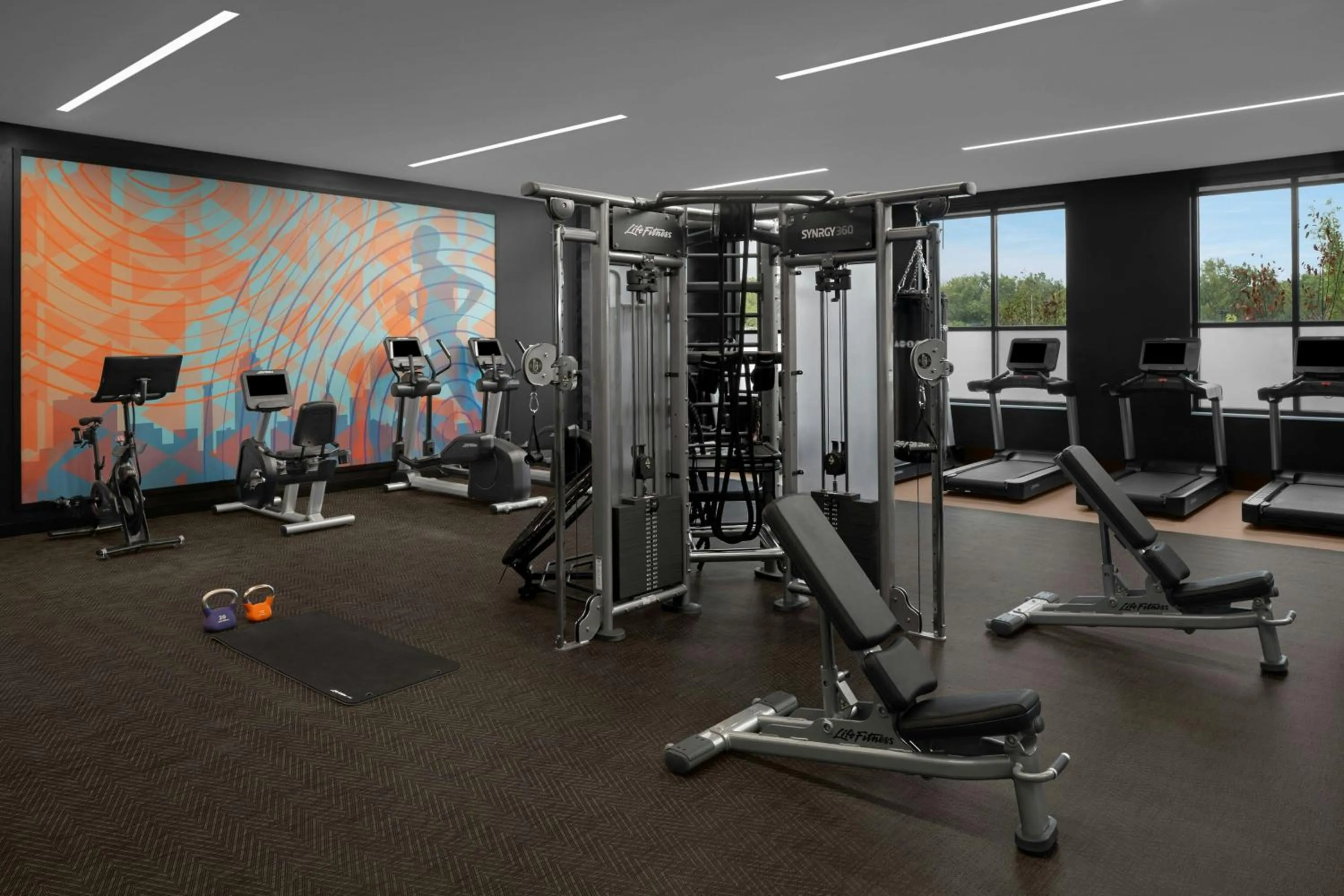 Fitness centre/facilities in AC Hotel by Marriott Lansing University Area