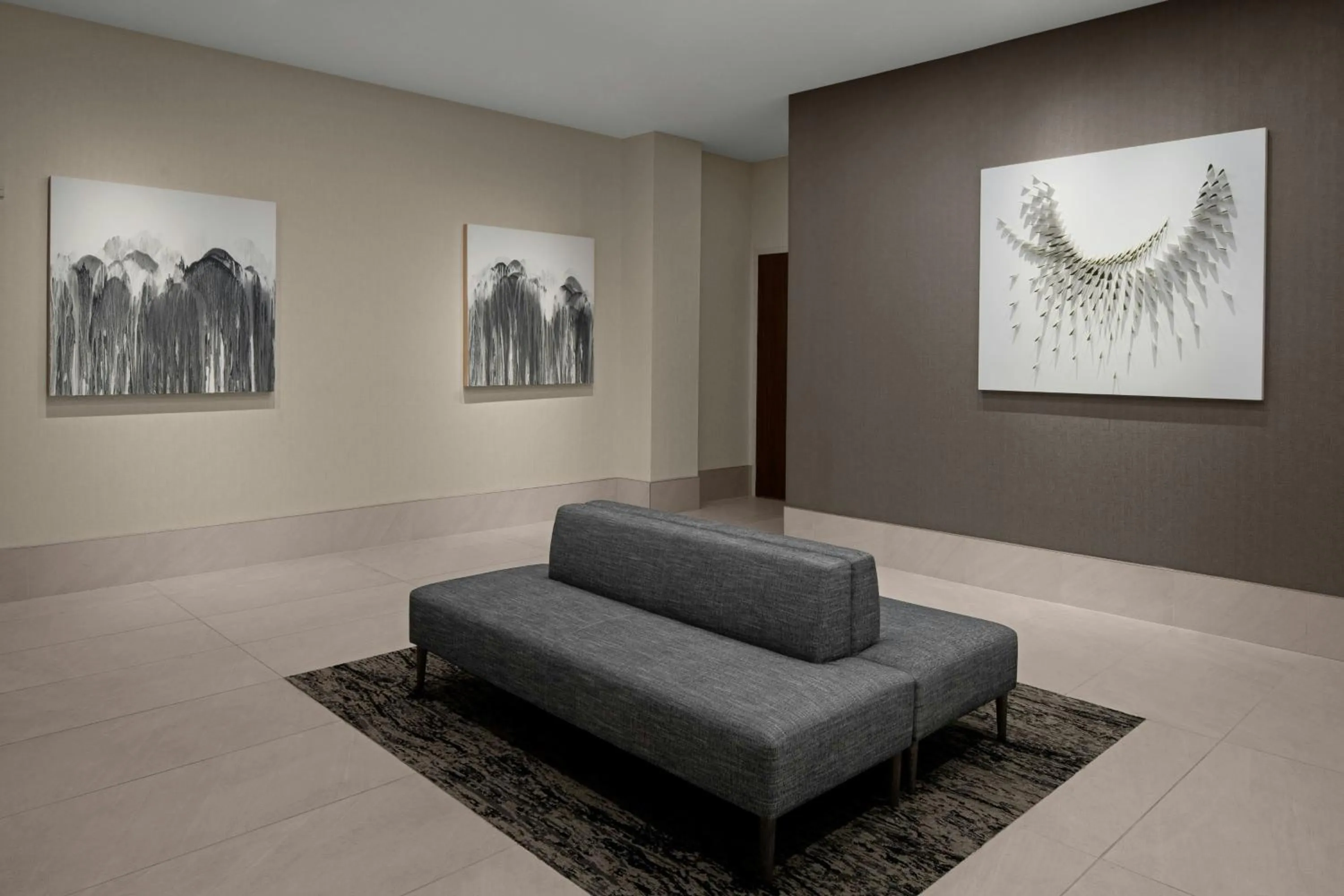 Lobby or reception in AC Hotel by Marriott Lansing University Area