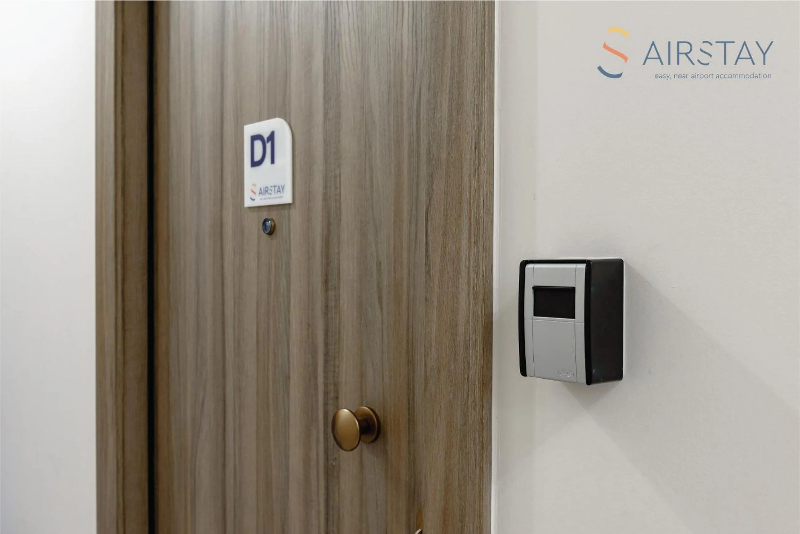 Property logo or sign in Zilean Apartments Airport by Airstay