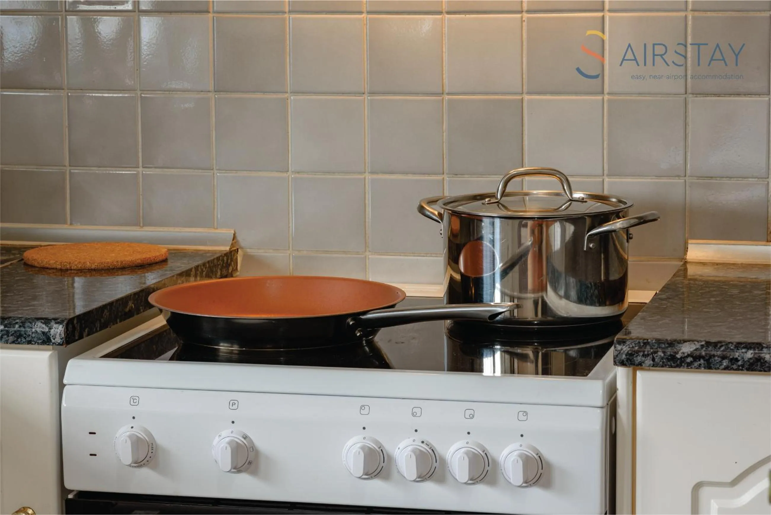 kitchen in Zilean Apartments Airport by Airstay