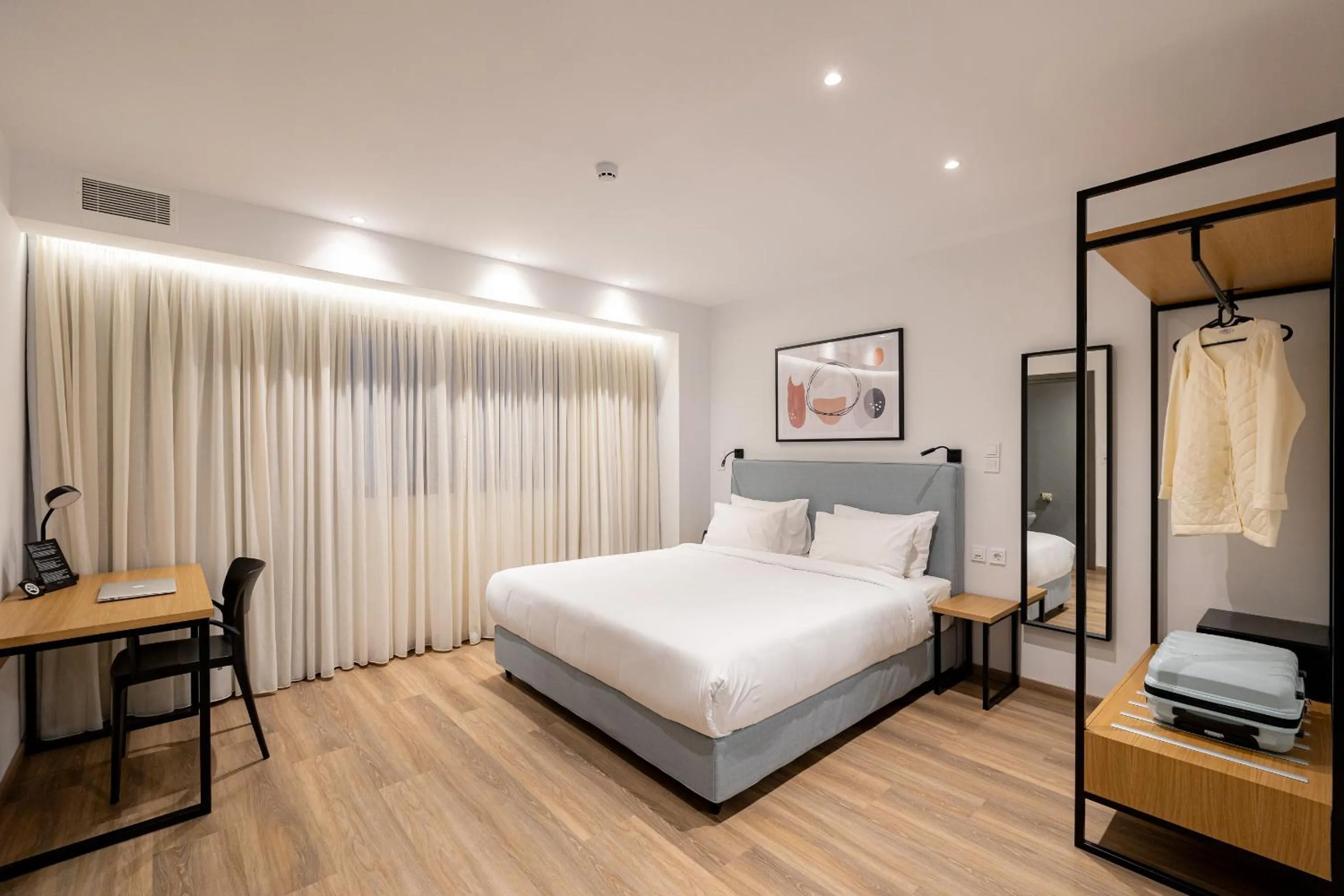 Photo of the whole room, Bed in Earos Urban Living