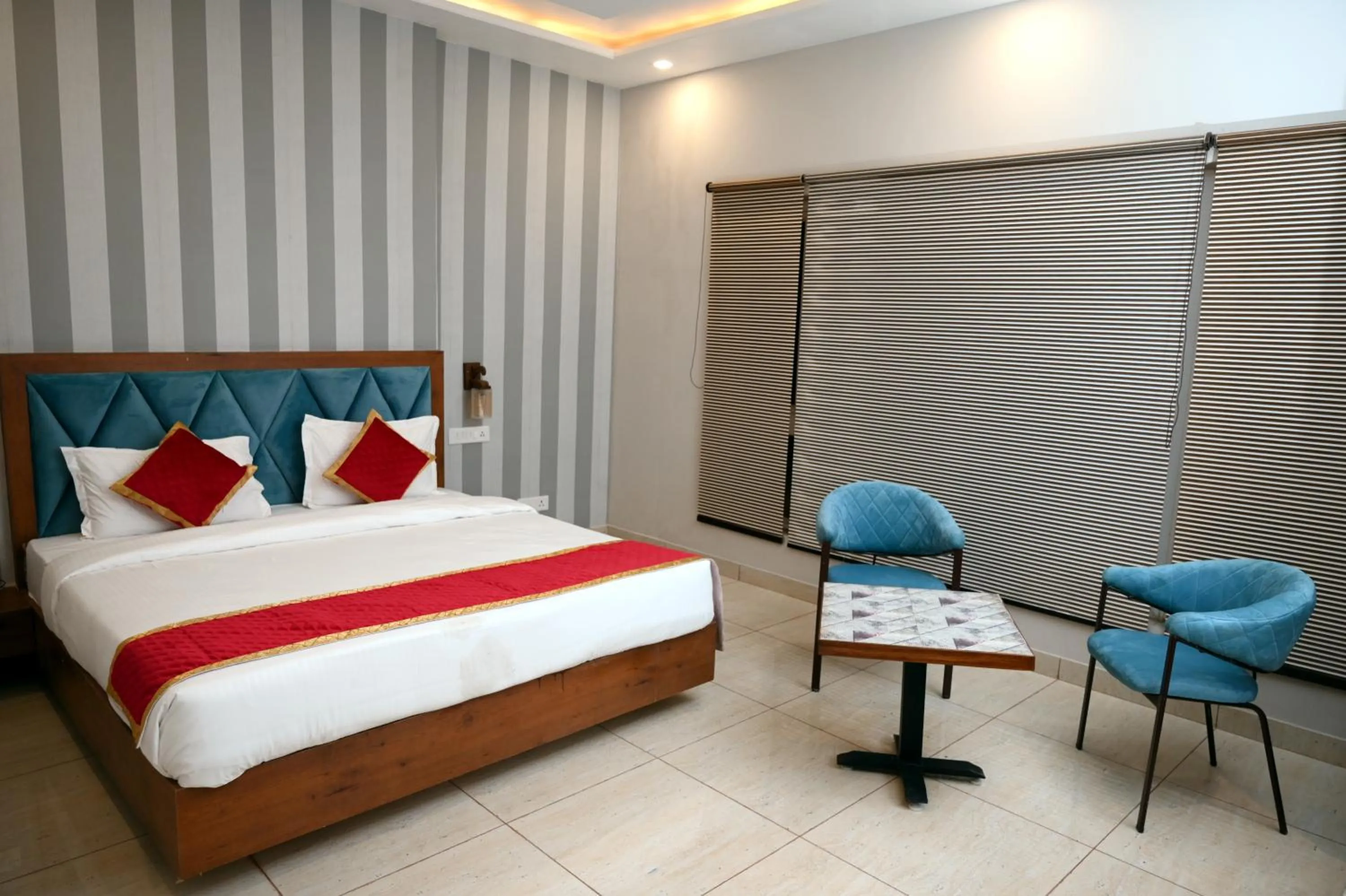 Bed in Hotel Singla Residency