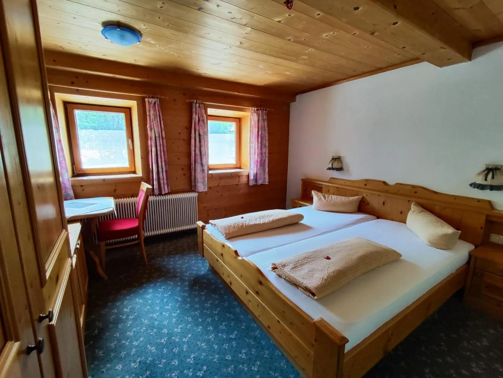 Photo of the whole room, Bed in Gasthaus Mitterjager