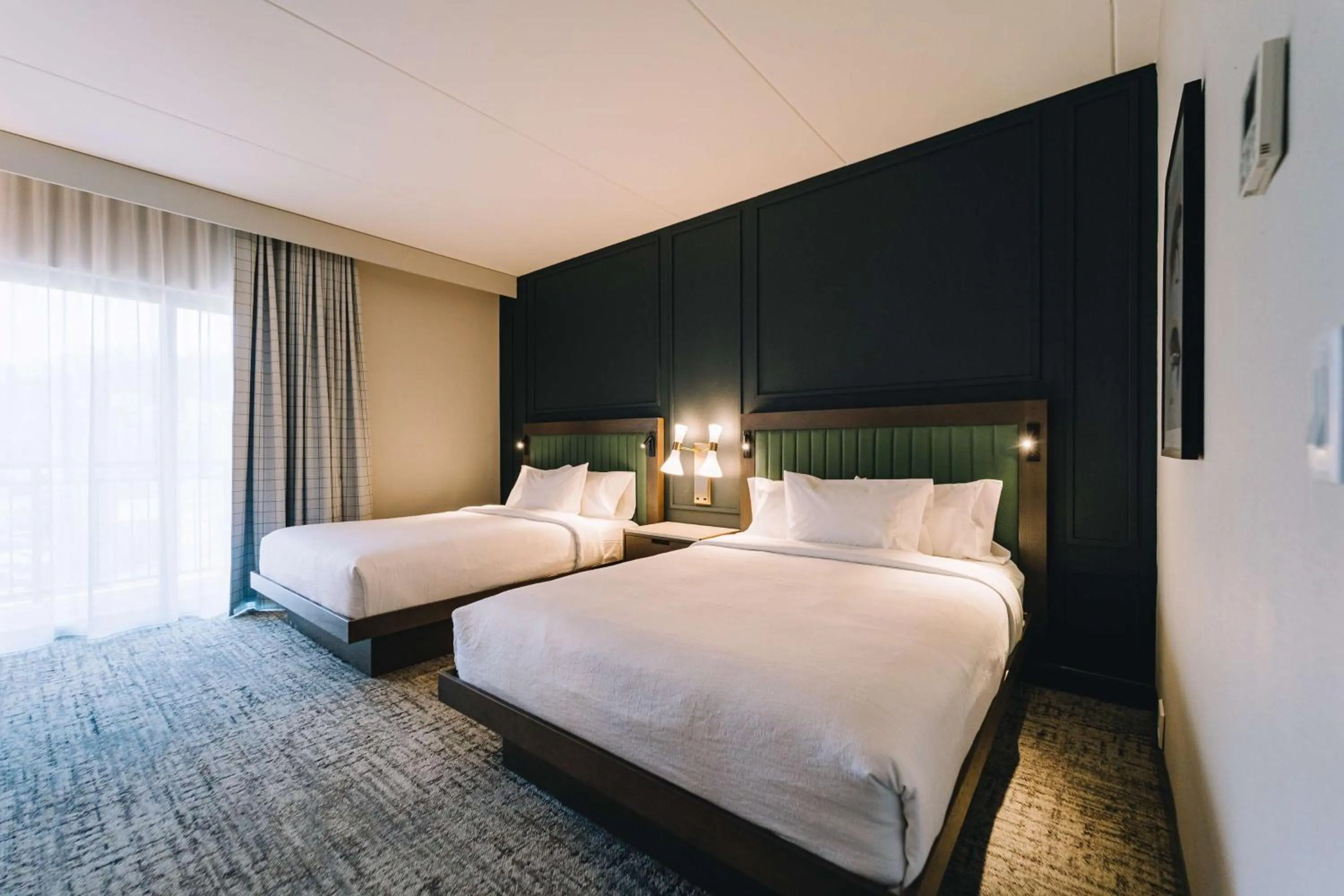 Bed in Embassy Suites By Hilton Gatlinburg Resort