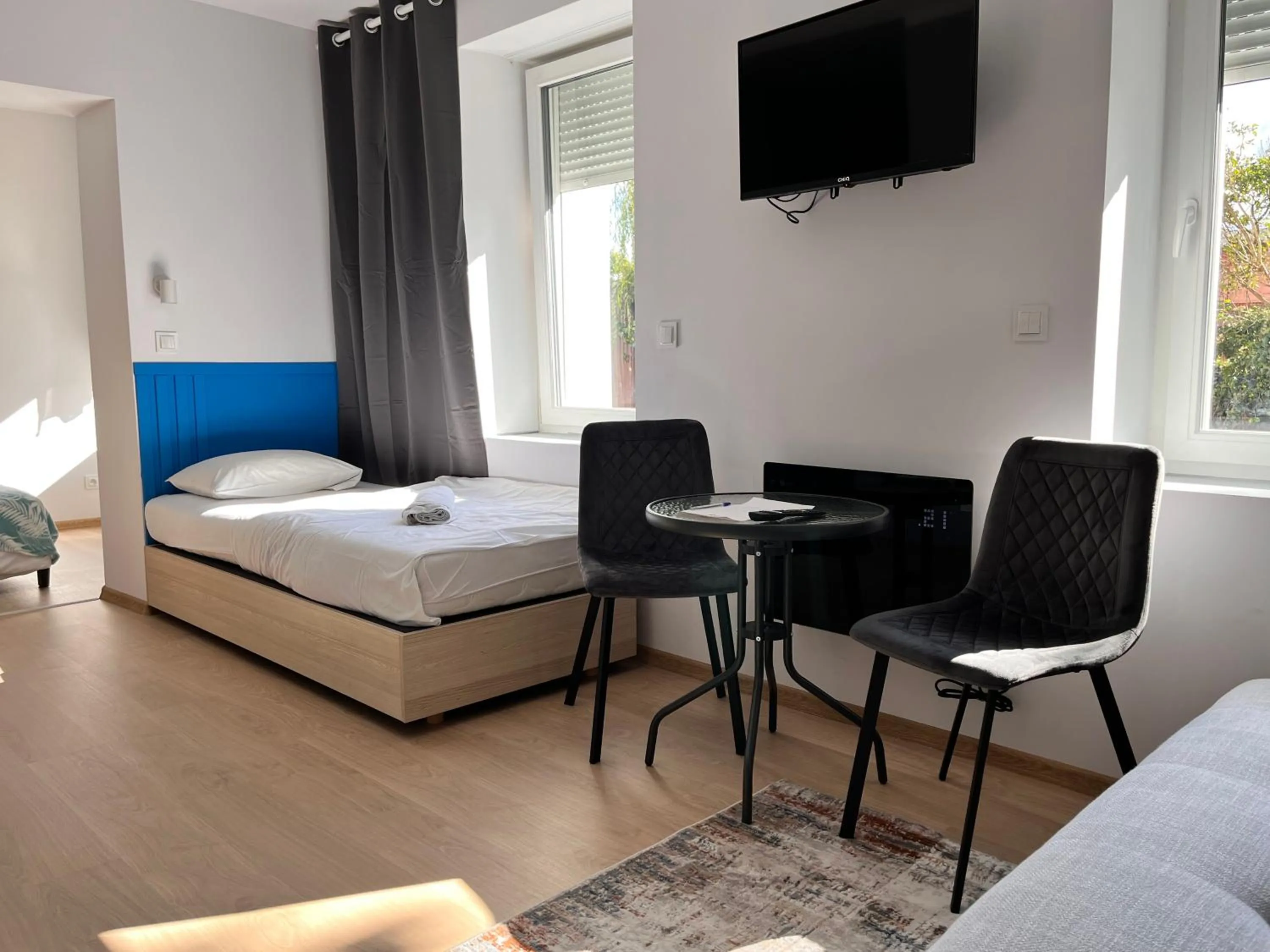 Bed in 3 Budget Stay Apartments