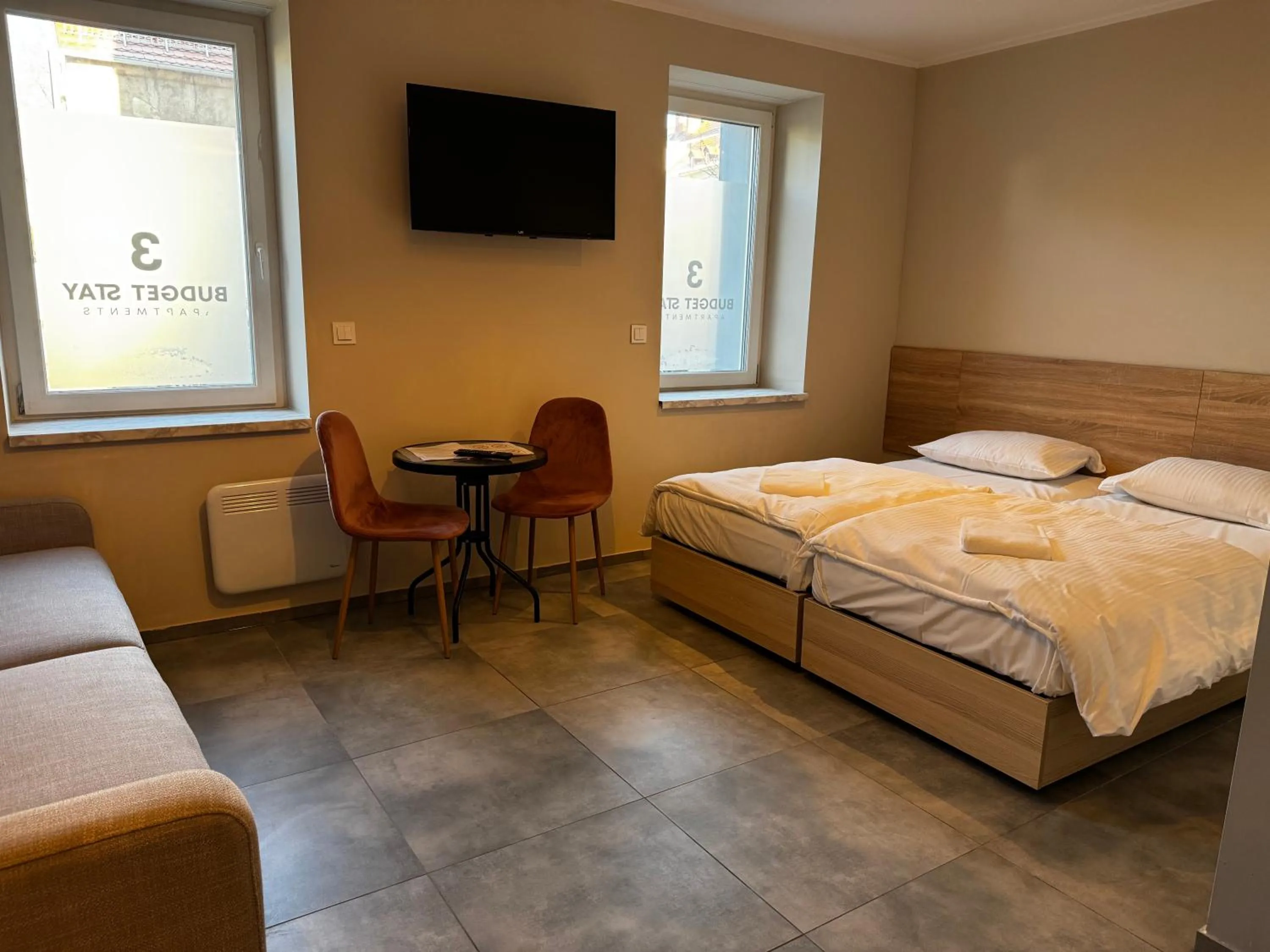 Bed in 3 Budget Stay Apartments