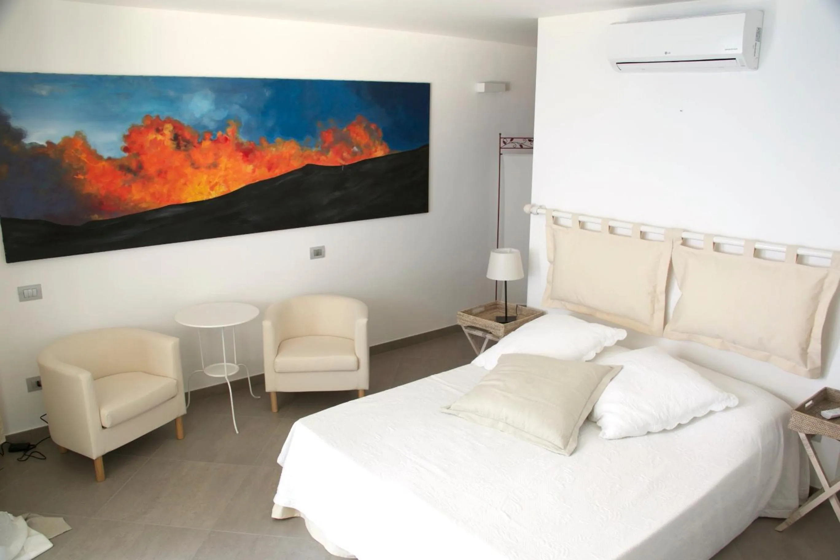 Bed in Il Gabbiano Relais in Stromboli