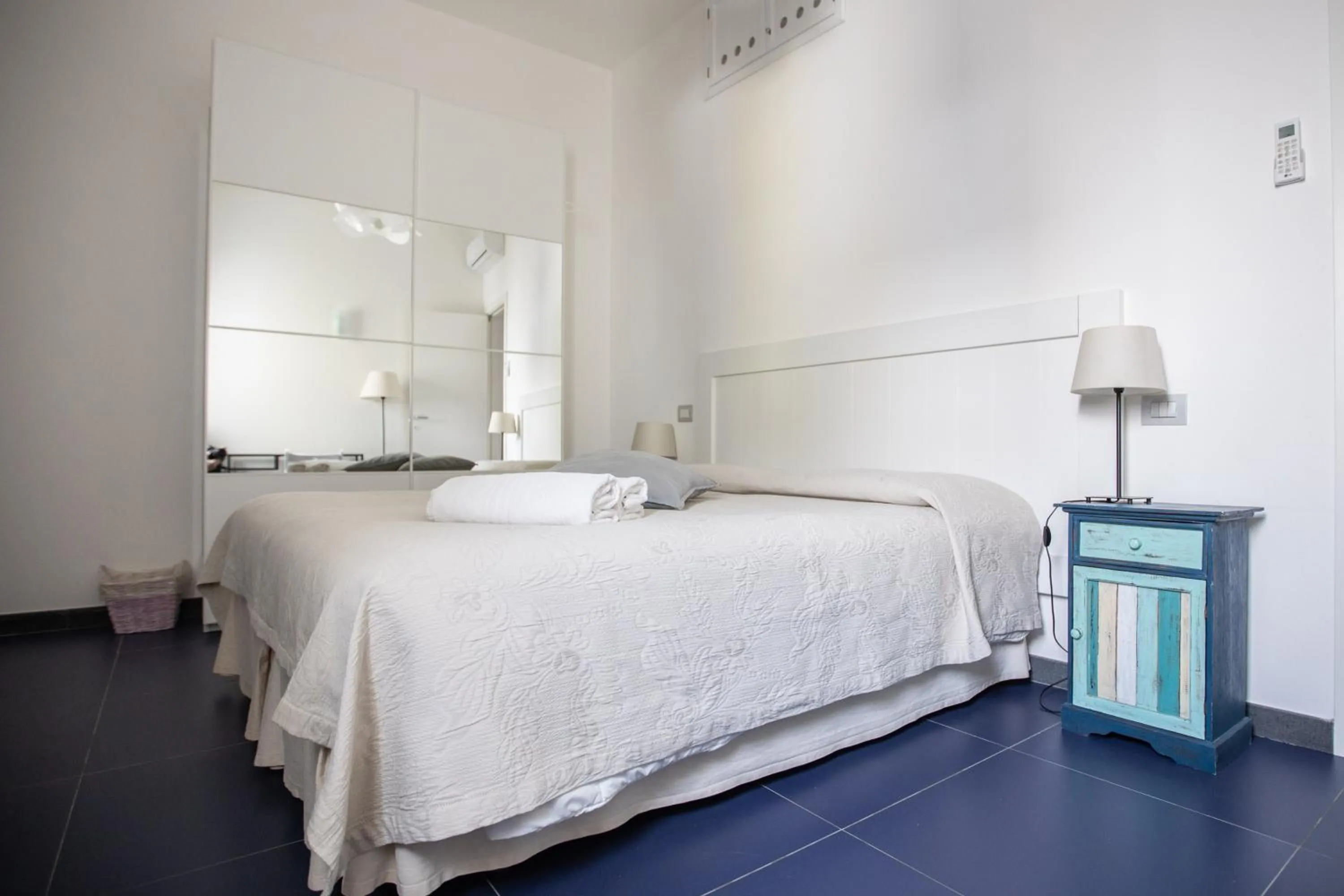 Bed in Il Gabbiano Relais in Stromboli