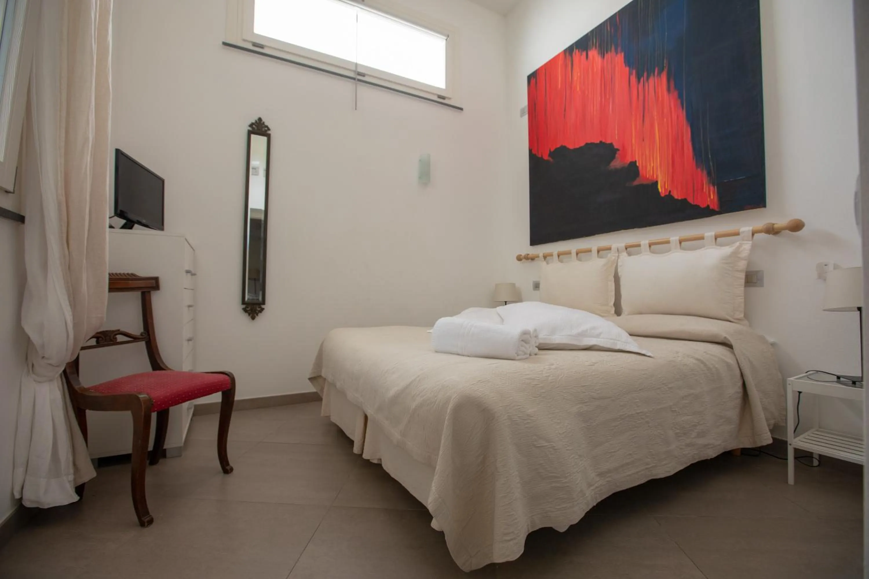 Bed in Il Gabbiano Relais in Stromboli