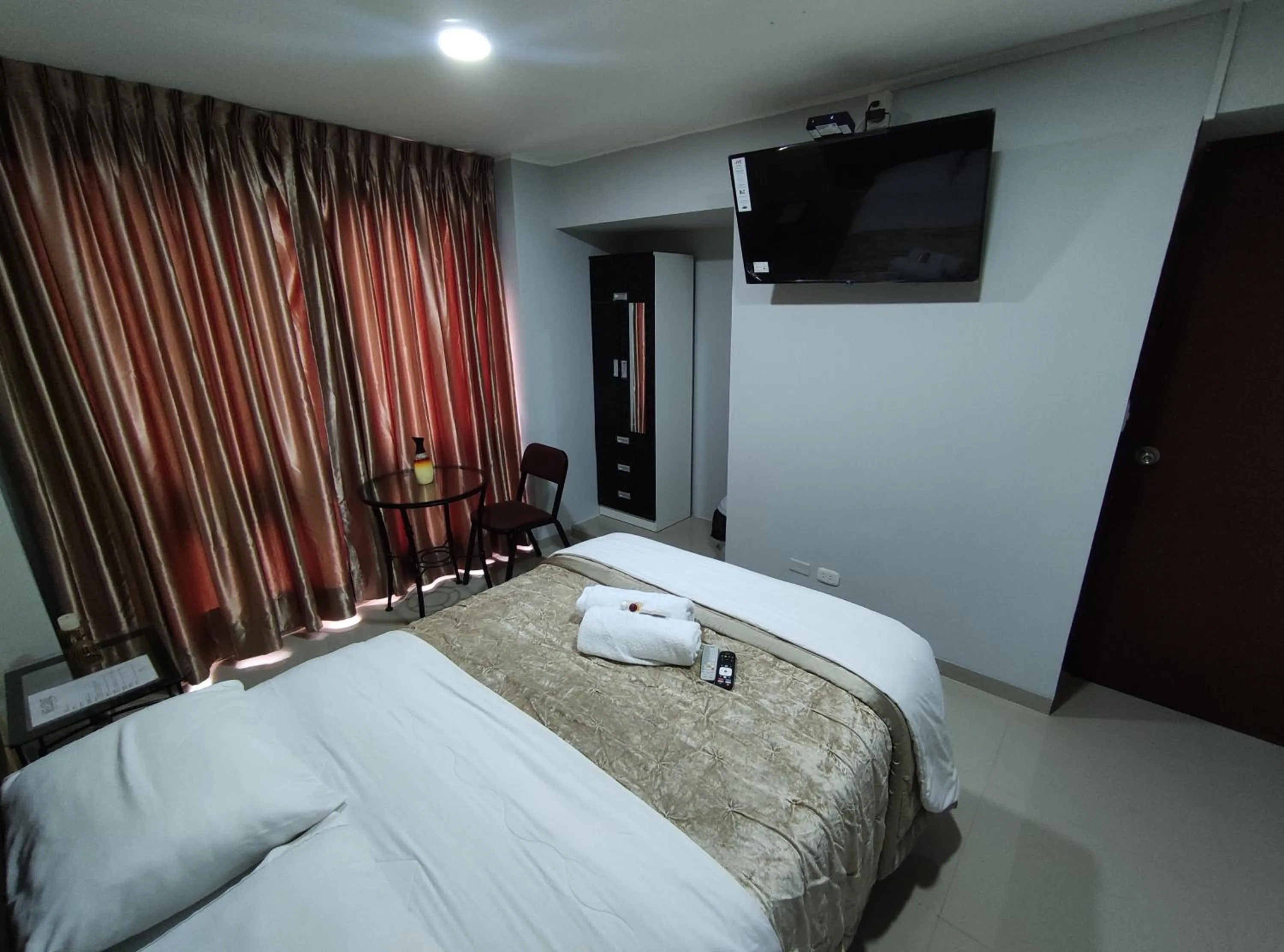 Photo of the whole room, Bed in Inti Llaqta Hotel & Suites