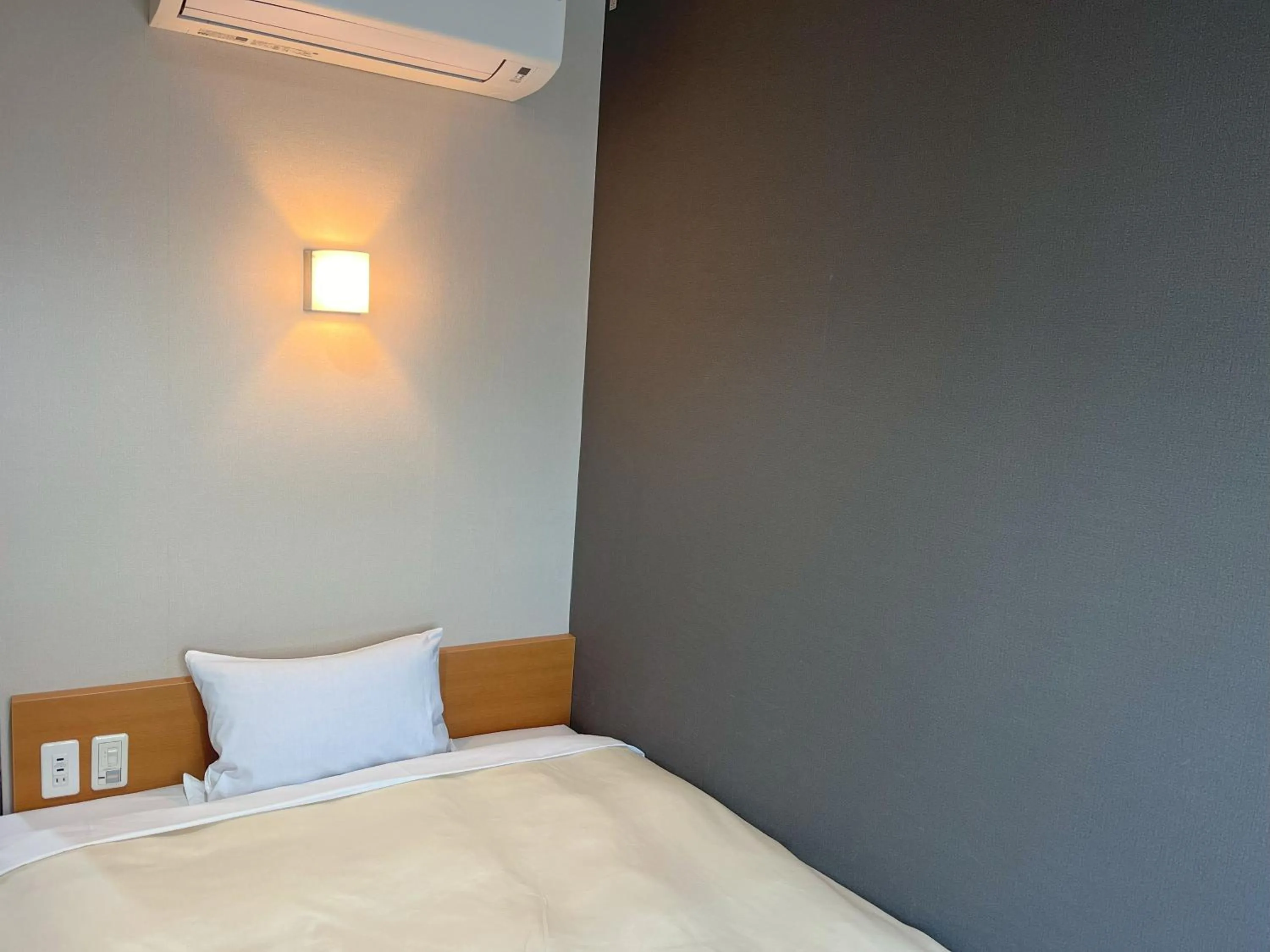 Bed in Hotel Kurume HIlls