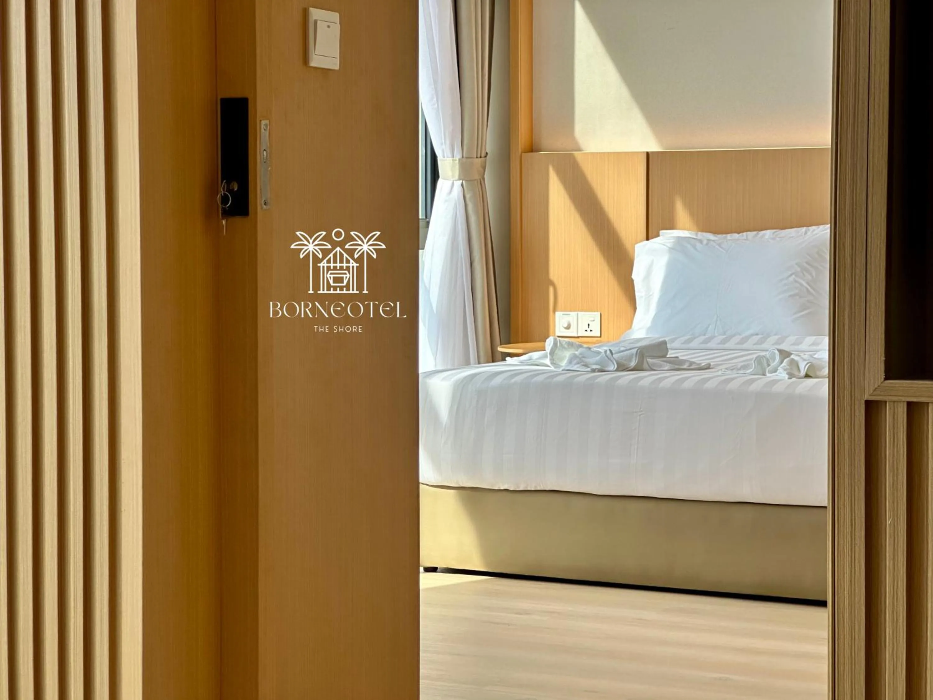 Bed in Borneotel The Shore KK by CHG