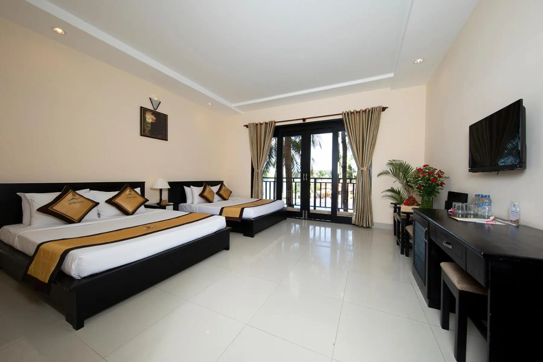 Bed in Hon Rom Central Beach Resort