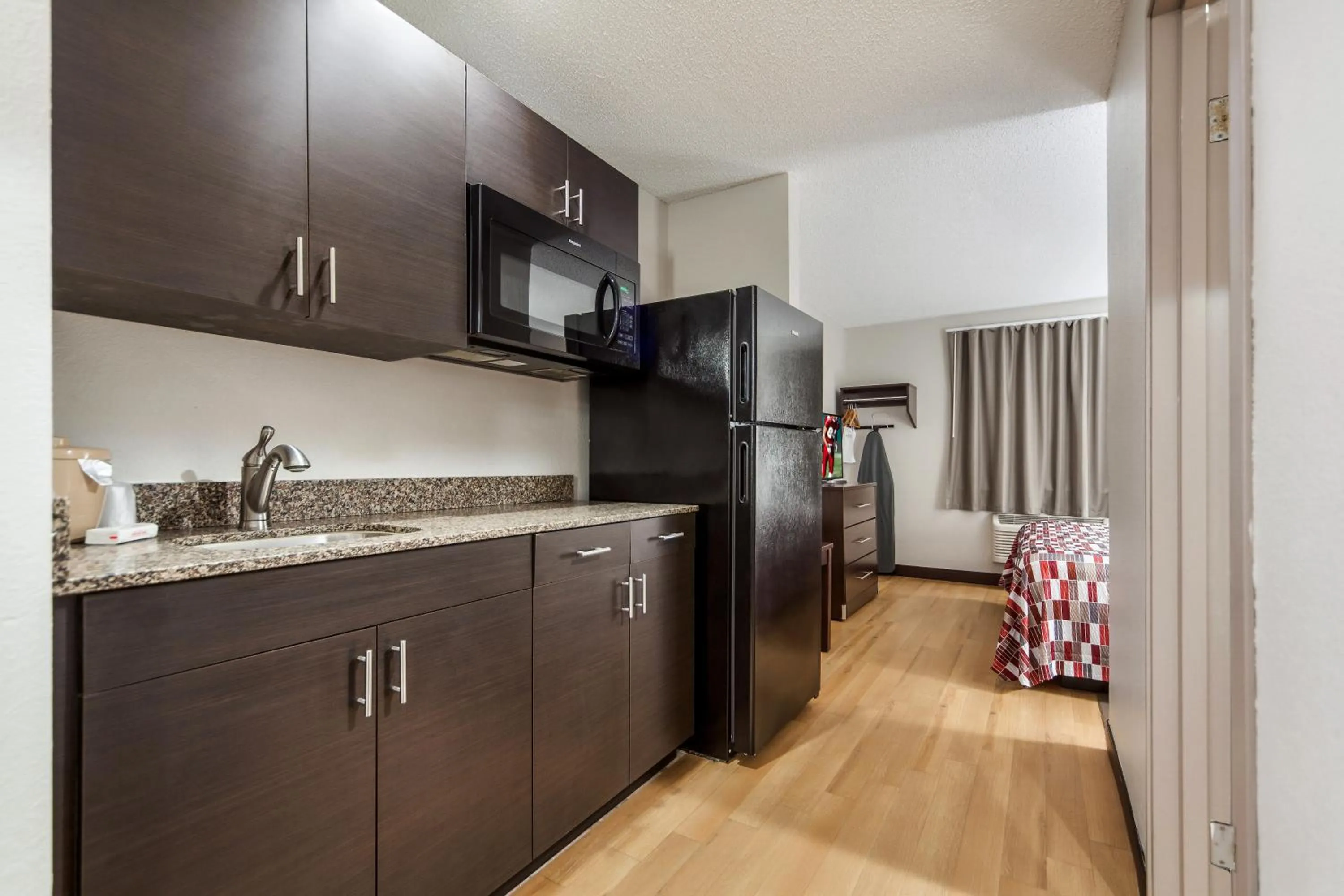 Photo of the whole room in Red Roof Inn & Suites Omaha - Council Bluffs