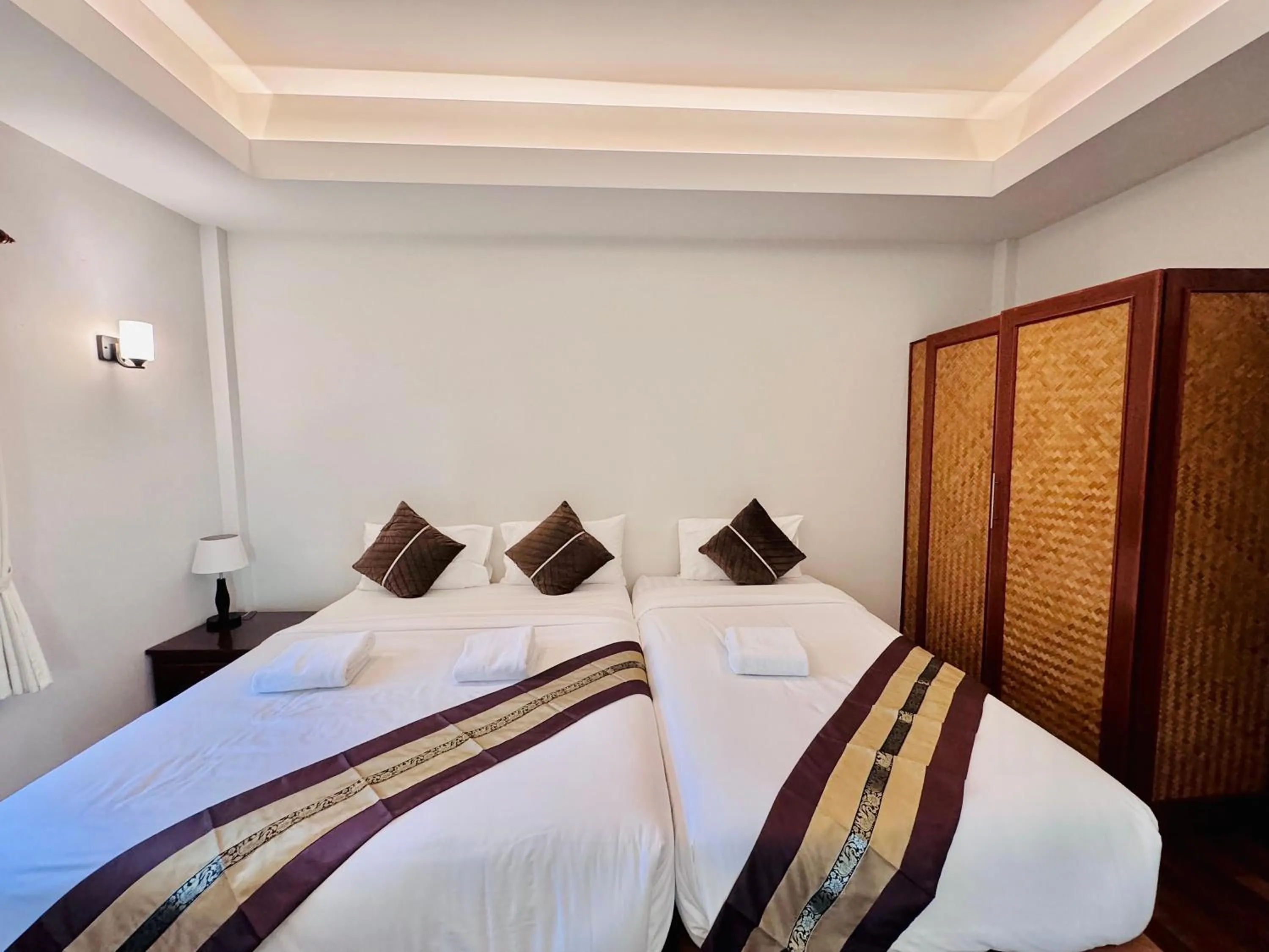 Bed in Lamai Bayview Boutique Resort