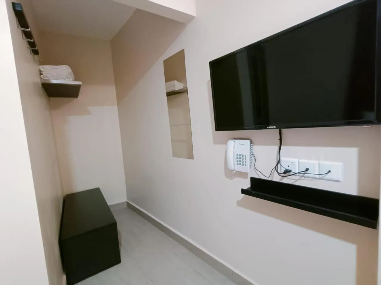 Bedroom in Capital O 90897 Island City Hotel