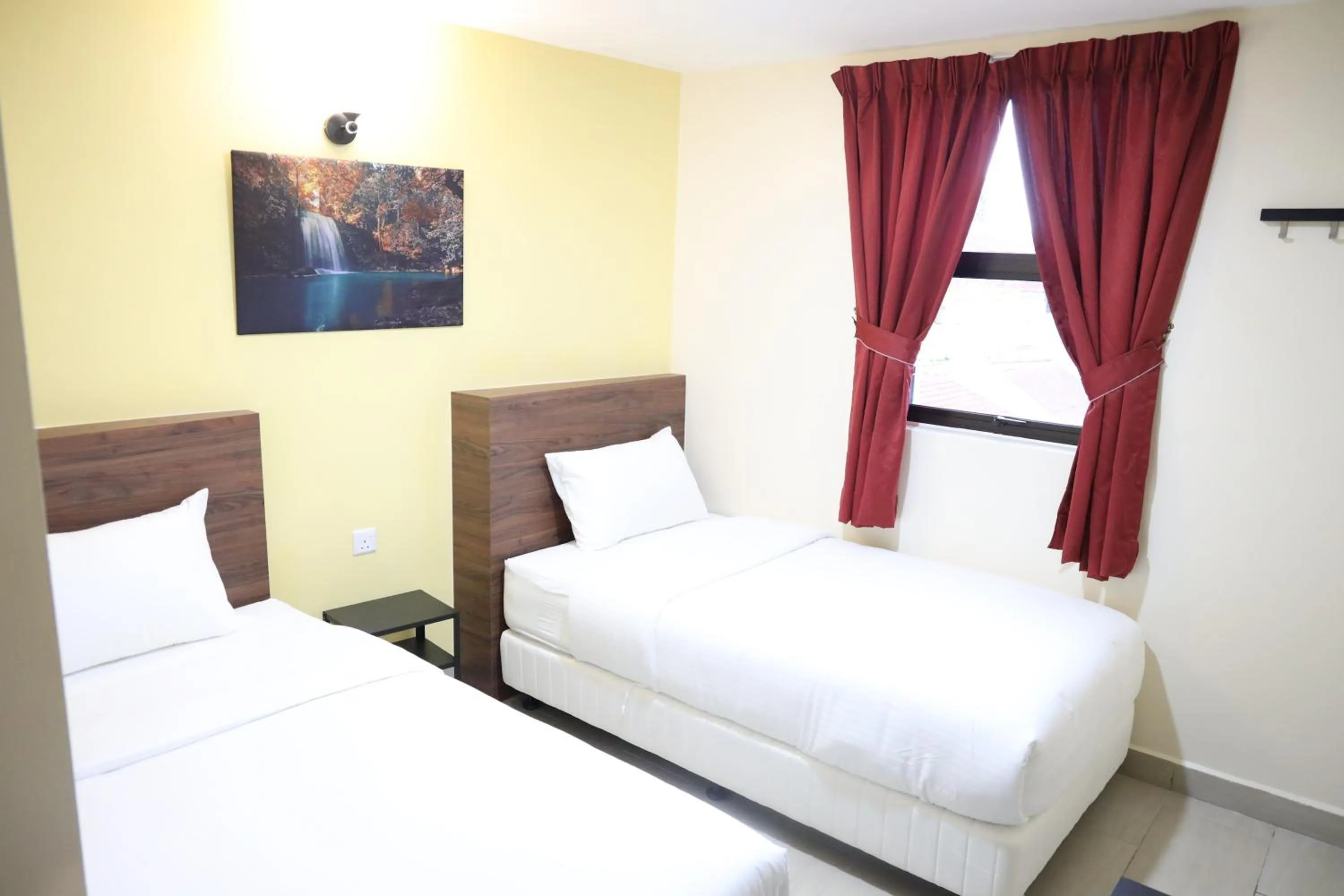 Bedroom, Bed in Capital O 90897 Island City Hotel