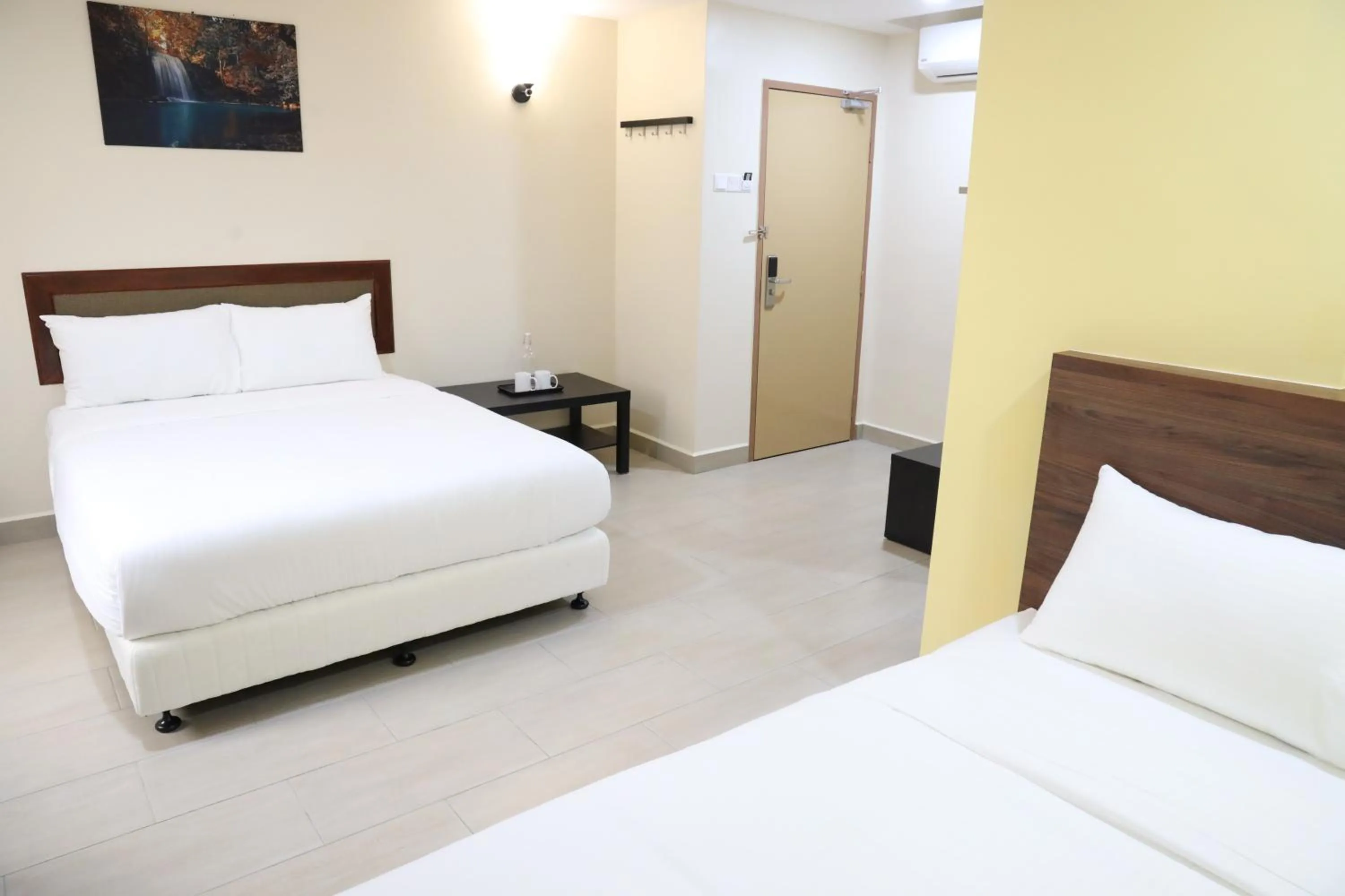 Bedroom, Bed in Capital O 90897 Island City Hotel